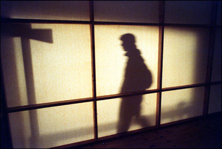 Parlato's shadowy figure seen as through a
