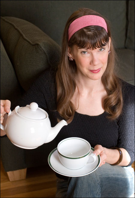 Miss Conduct pours tea