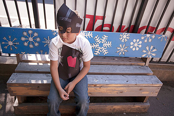 Student Denny Diaz prepares to act out his part as the Tin Man in “The Wizard of Oz.”