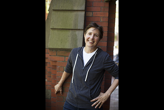 Associated Press photographer Elise Amendola is pictured in Harvard Yard. Photo by Stephanie Mitchell/Harvard Staff Photographer