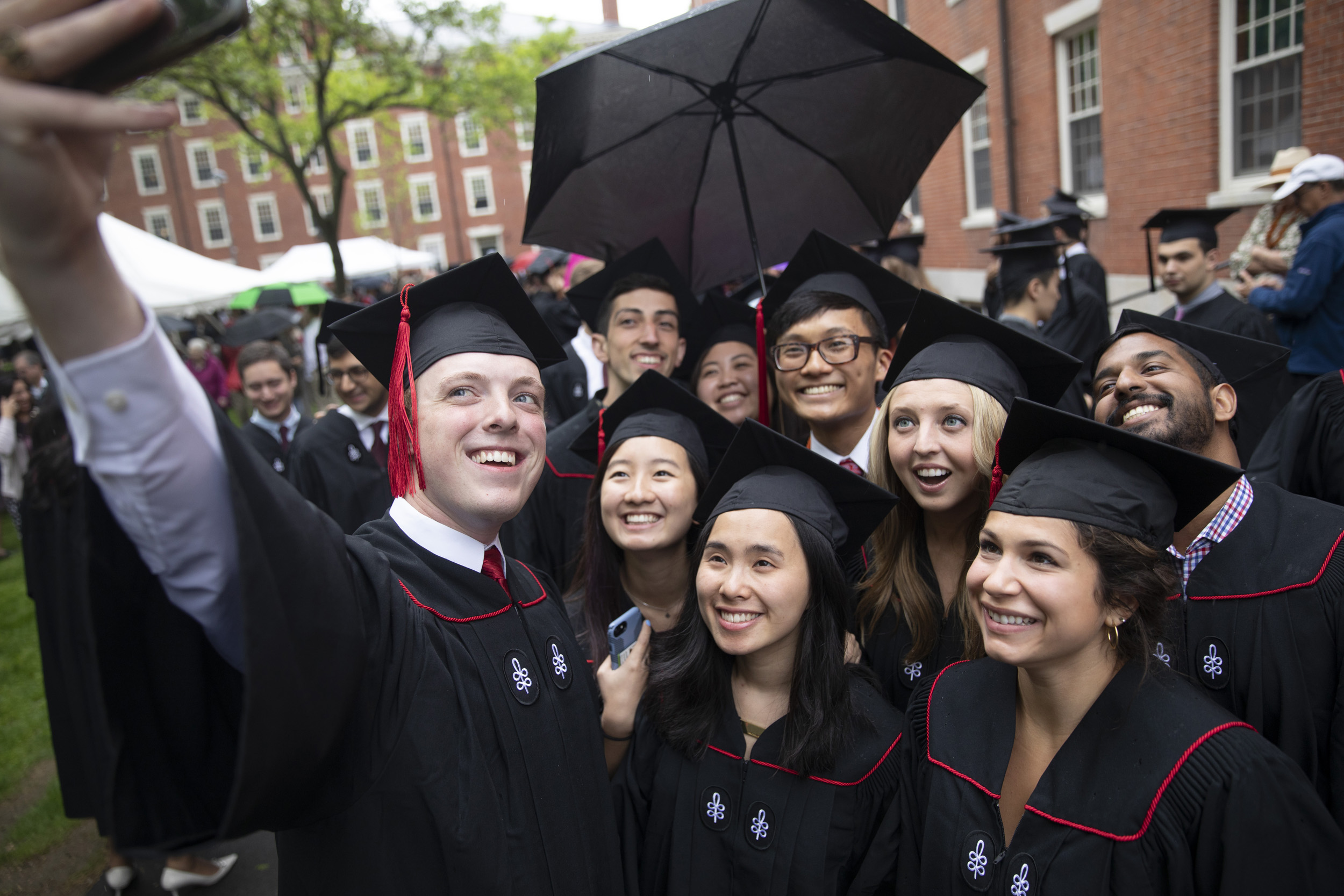 Group of students take a selfie before baccalaureate service.