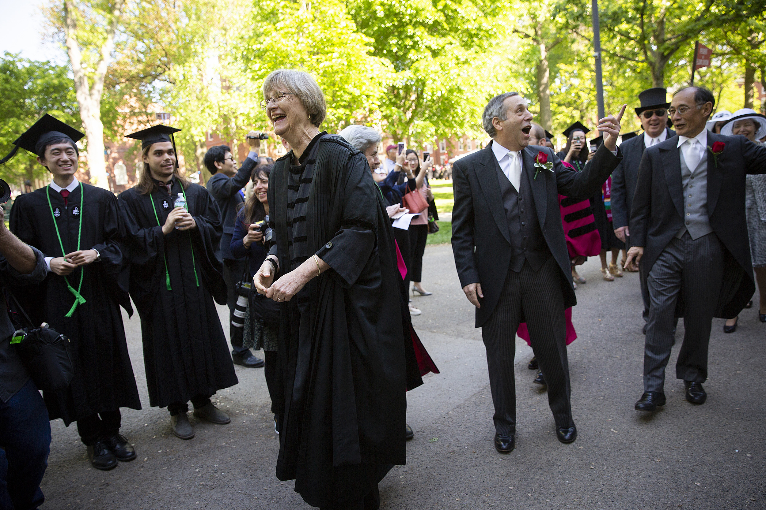 Drew Faust and Larry Bacow during commencement.