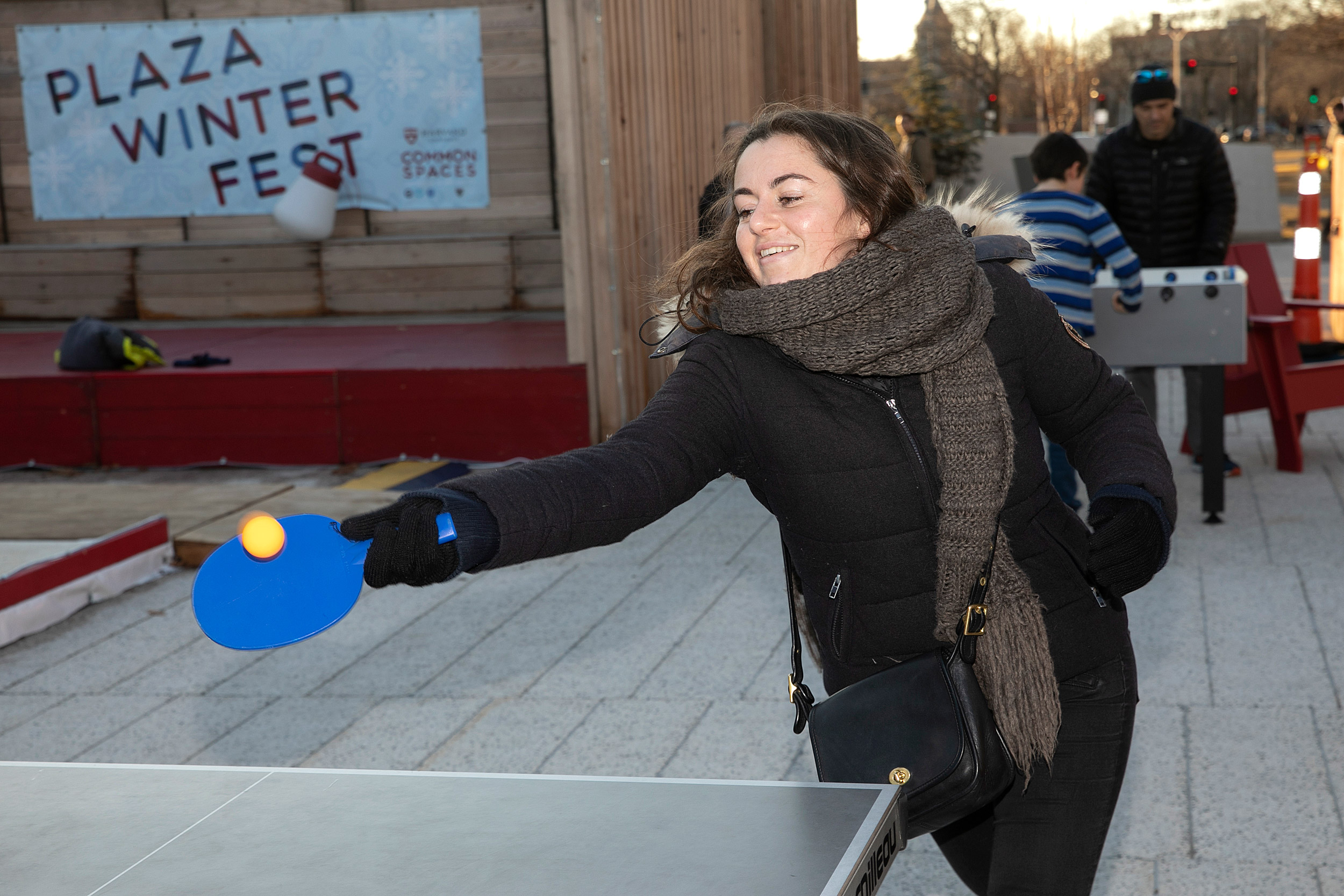 a woman playing ping pong