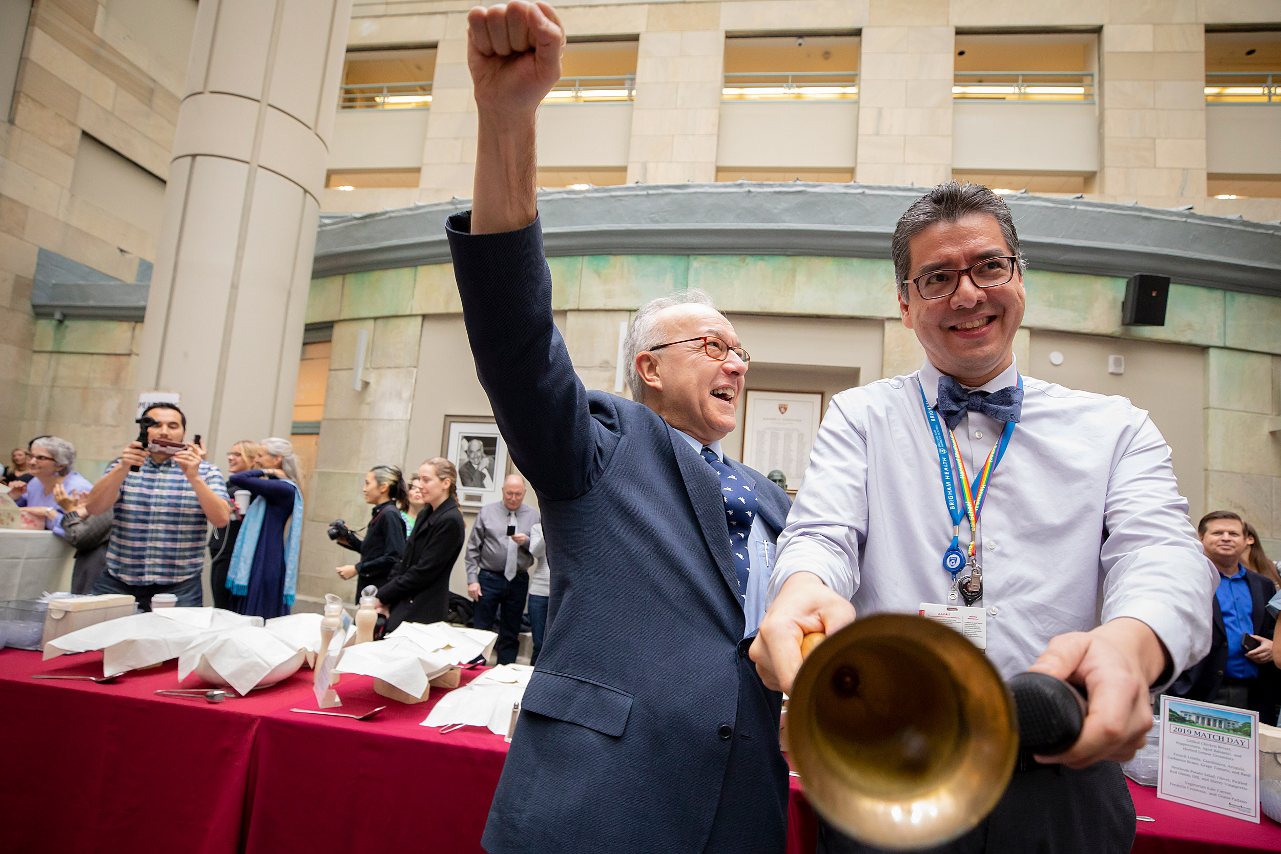 George Daley and Fidencio Saldana ring the bell signaling the big reveal.