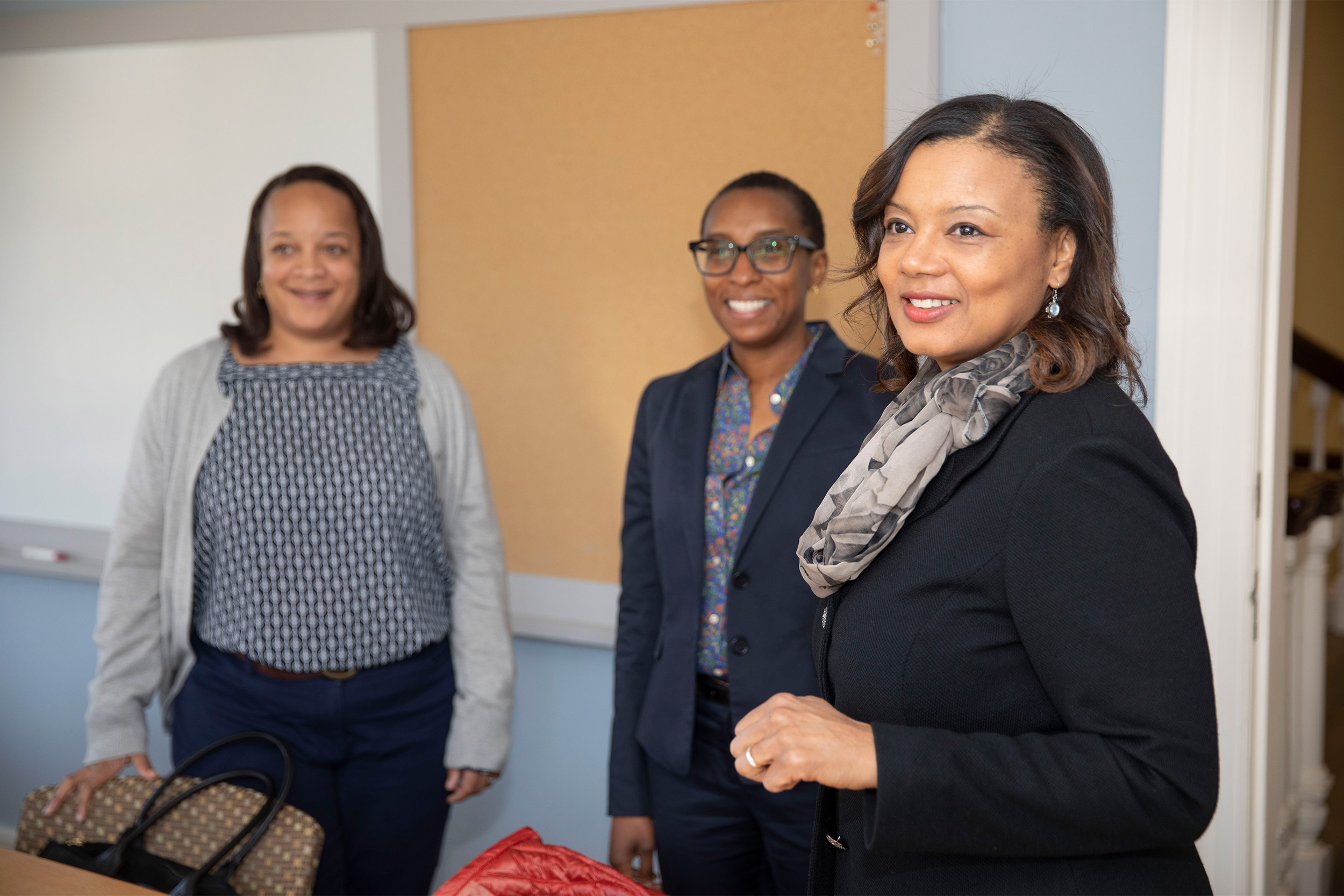 Bridget Terry Long, (from left) Saris Professor of Education and Economics, Dean of the Harvard Graduate School of Education (HGSE), Claudine Gay, the Edgerley Family Dean of the Faculty of Arts and Sciences (FAS), Tomiko Brown-Nagin, dean of Harvardís Radcliffe Institute for Advanced Study, meet in Fay House.