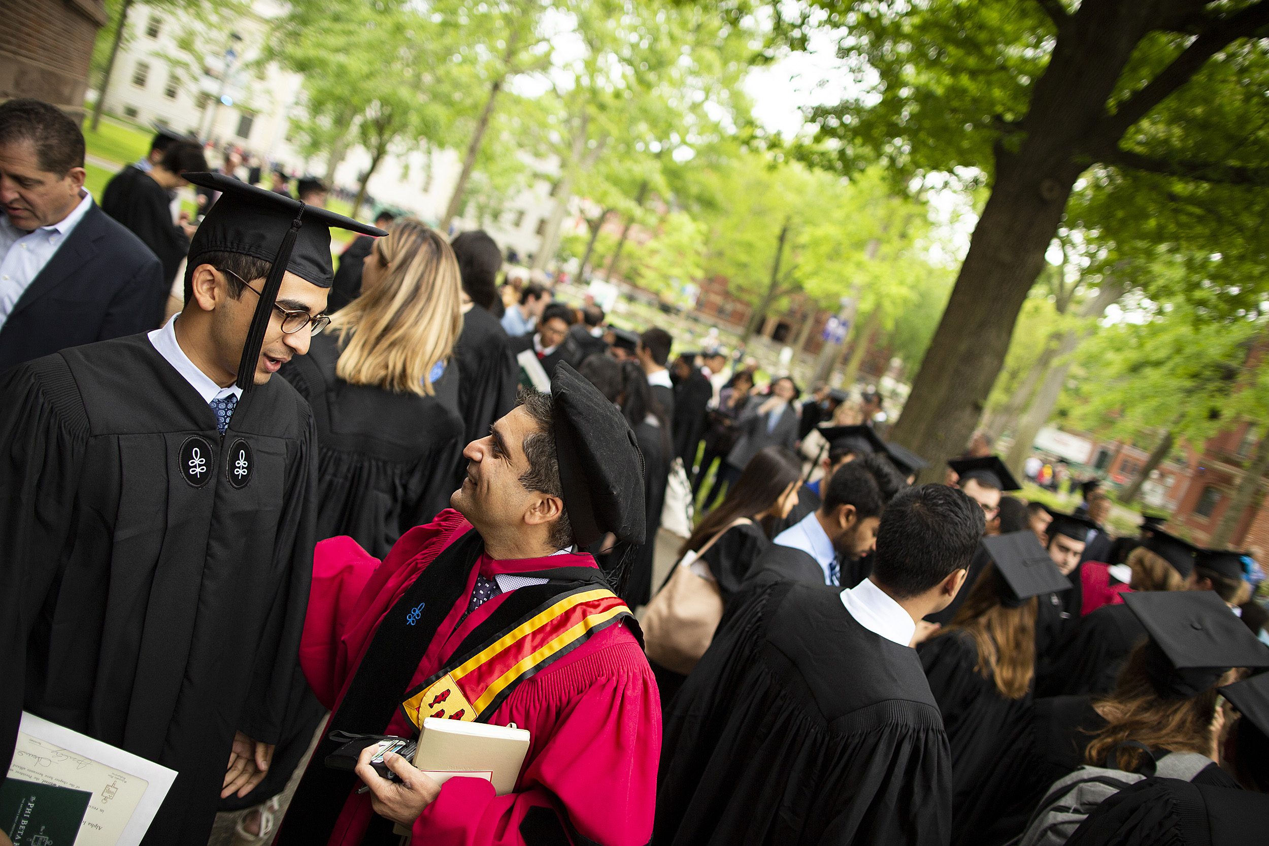 Kabir Gandhi and Harvard College Dean Rakesh Khurana speak in Harvard Yard.