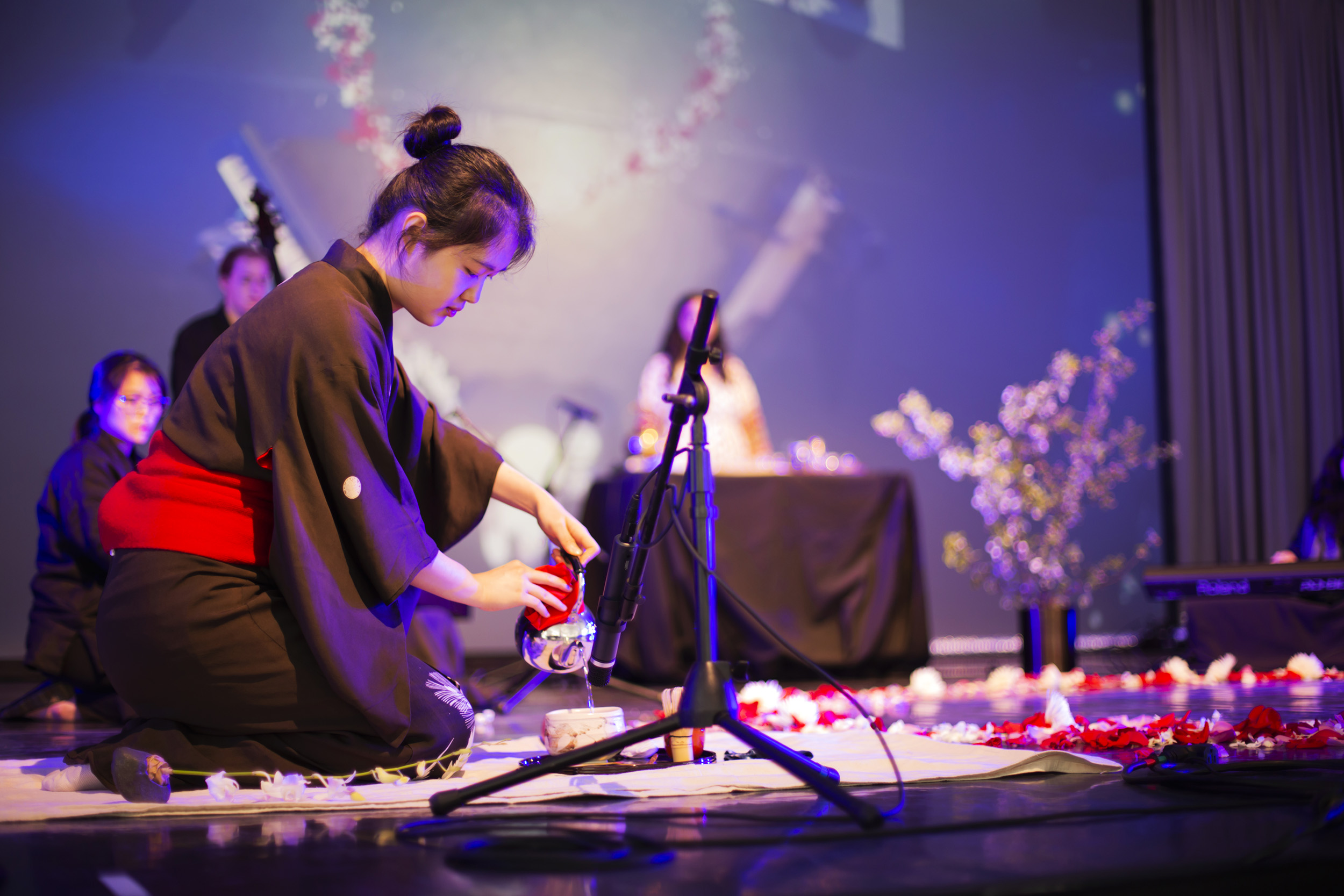 World Tea Cup tea ceremony on a stage.