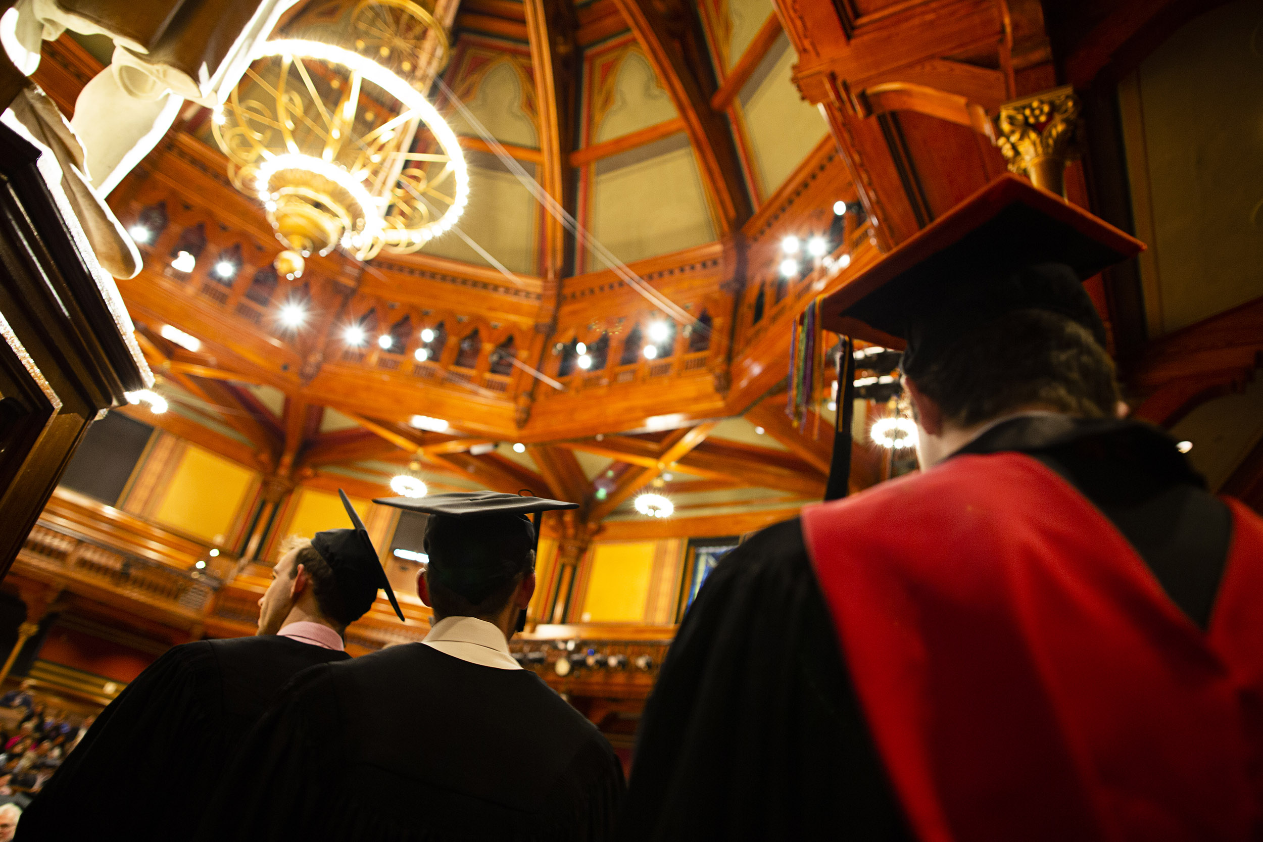 Seniors enter Sanders Theatre for Phi Beta Kappa Literary Exercises.