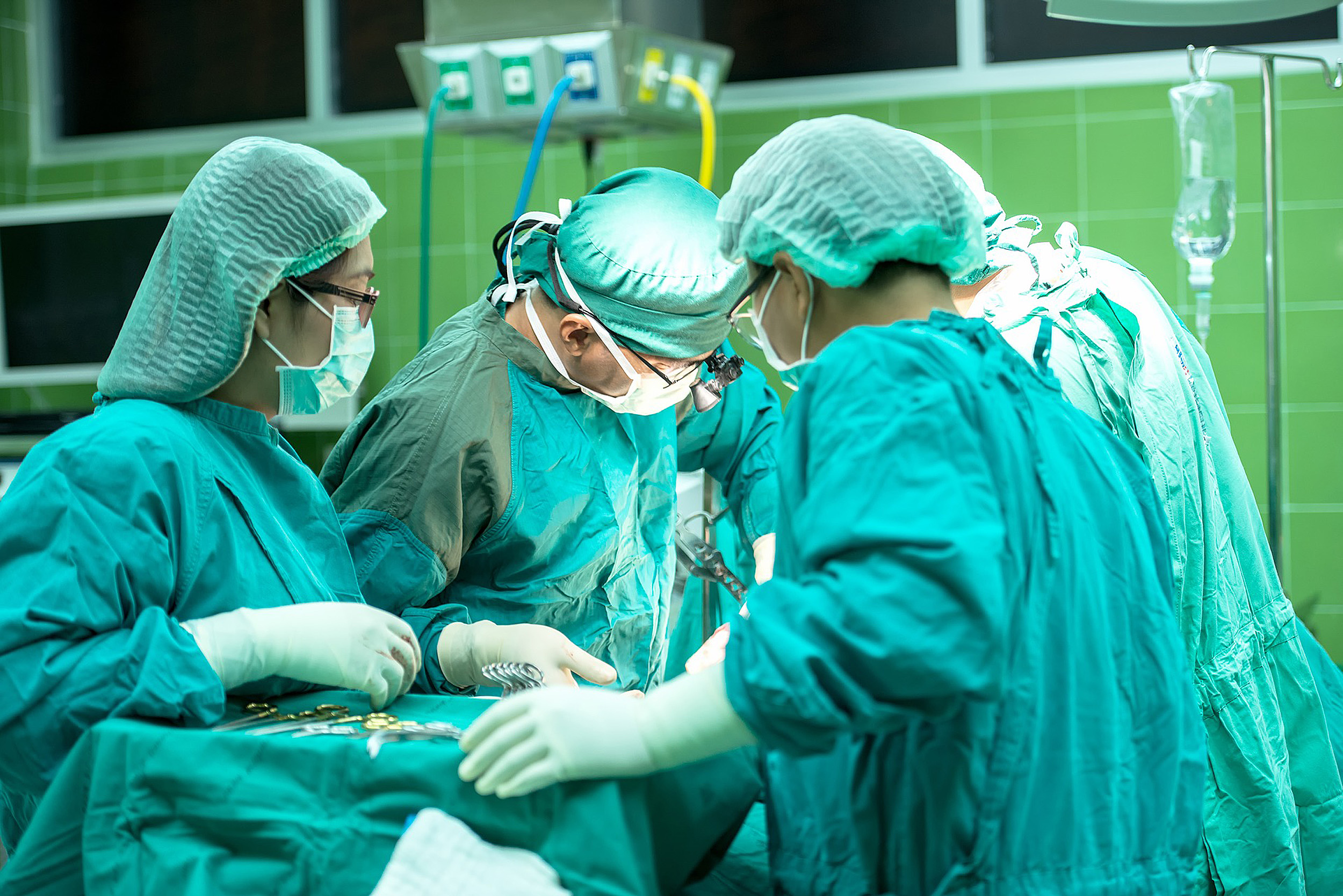 Surgeons performing an operation