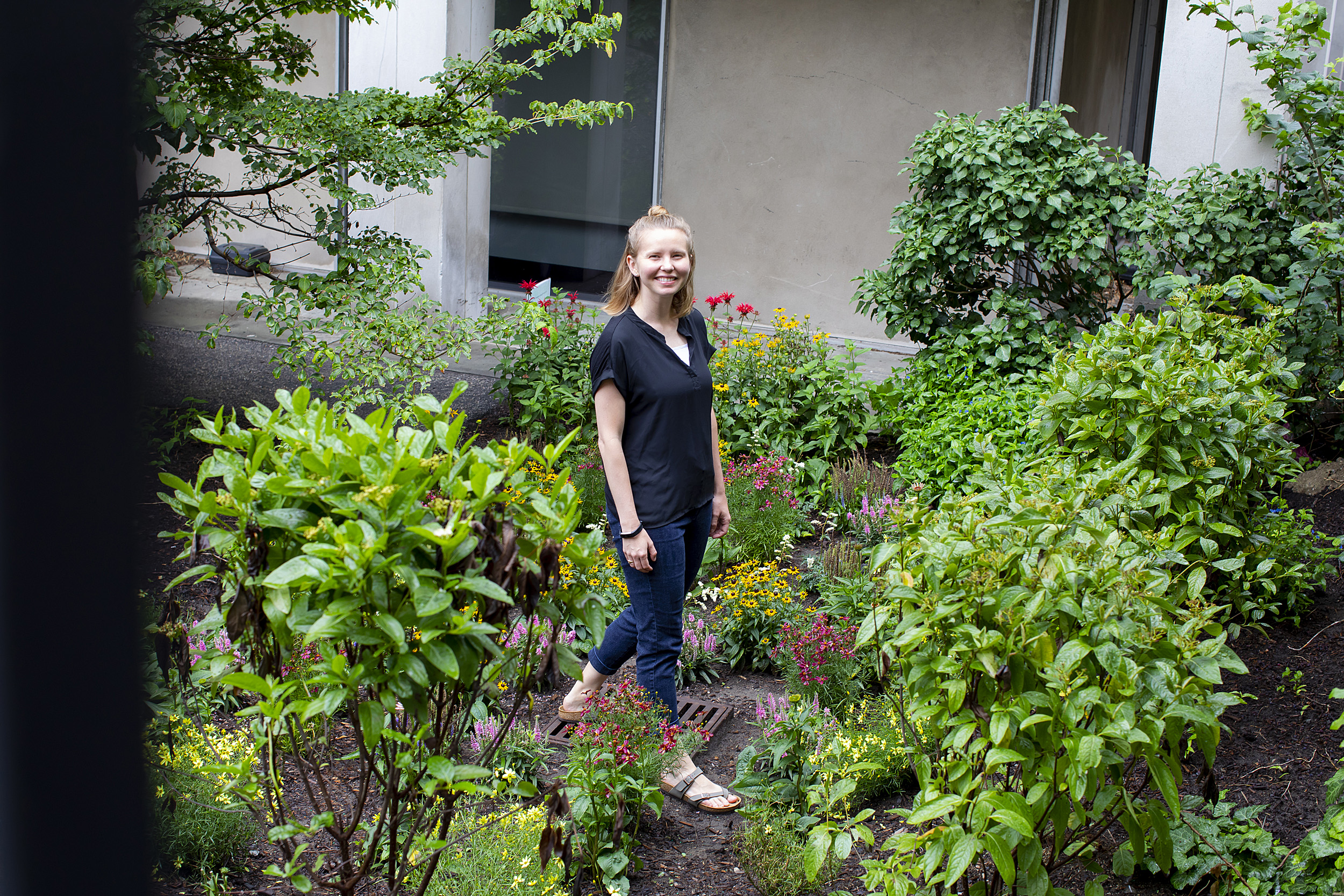 Tia Akins in the rain garden