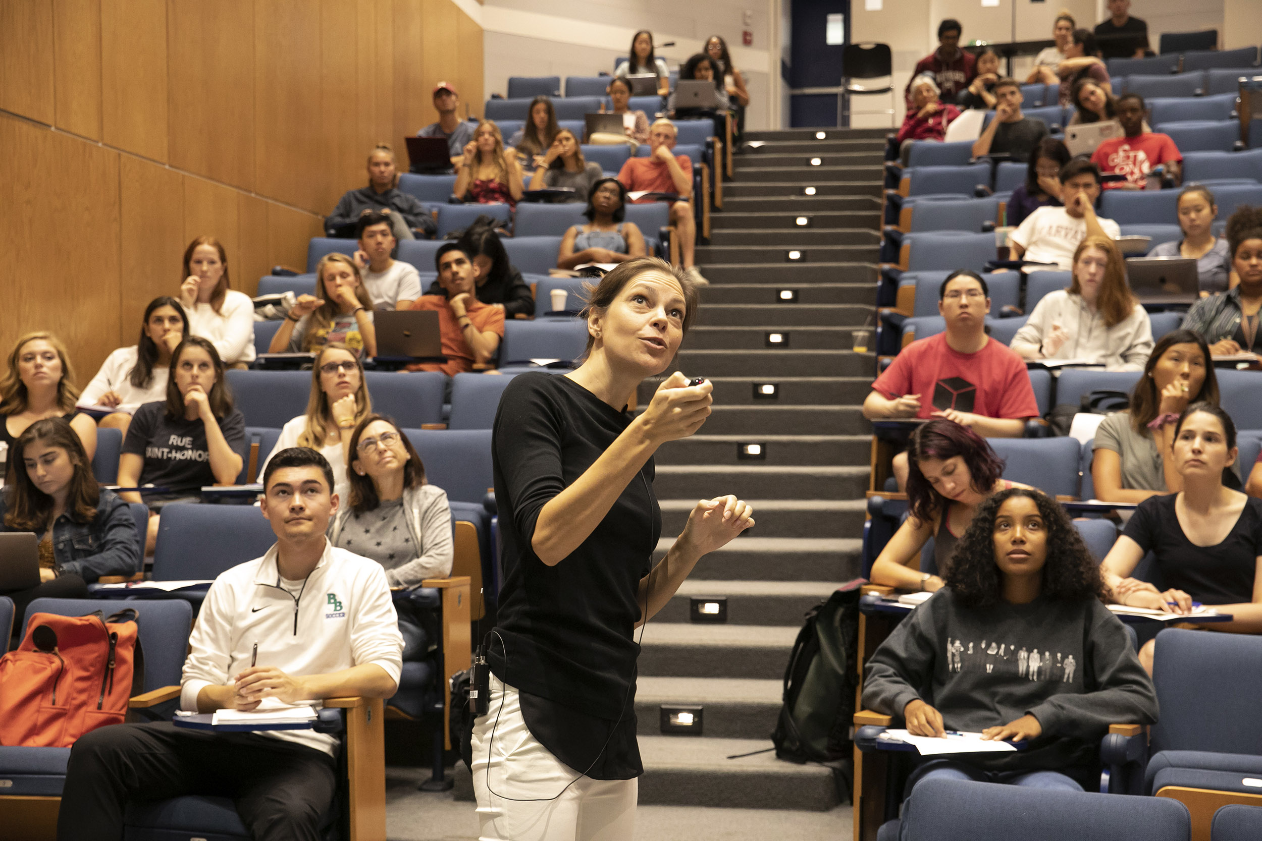 Pia Sorensen teaches from front of classroom.