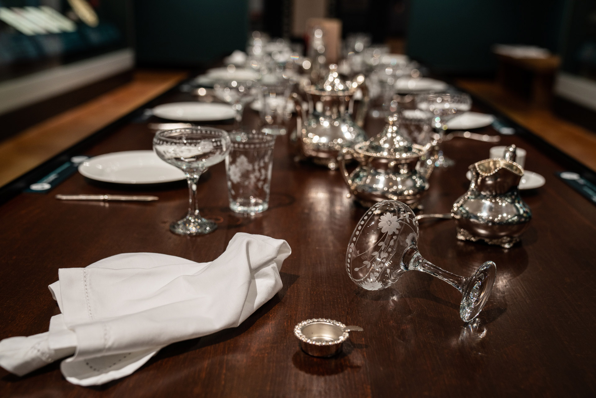 Crystal glasses at a table setting for a party