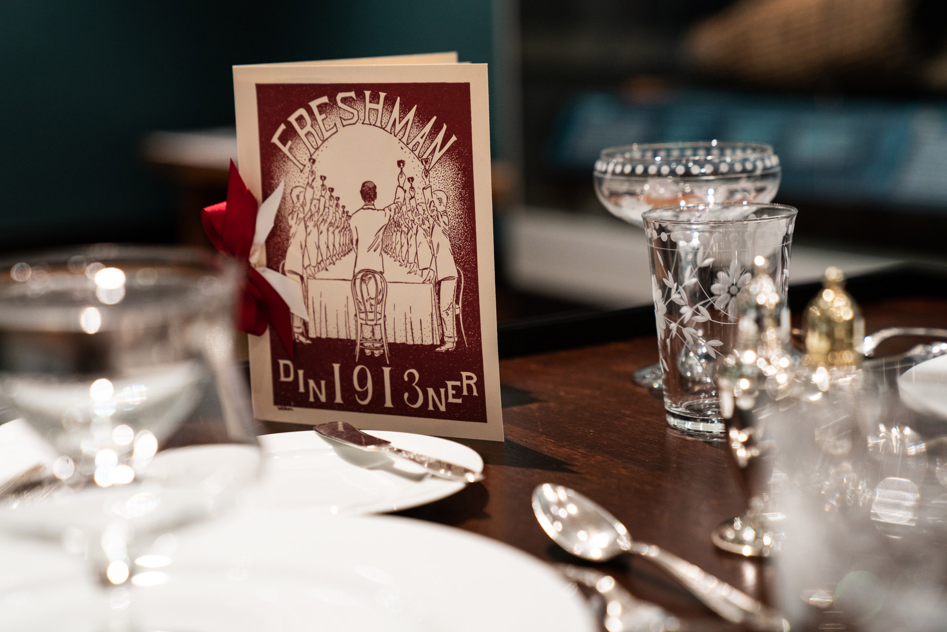 Class of 1913 card on a table