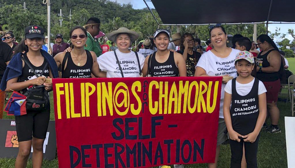 Kristin Oberiano in a parade asking for Guam's self determination