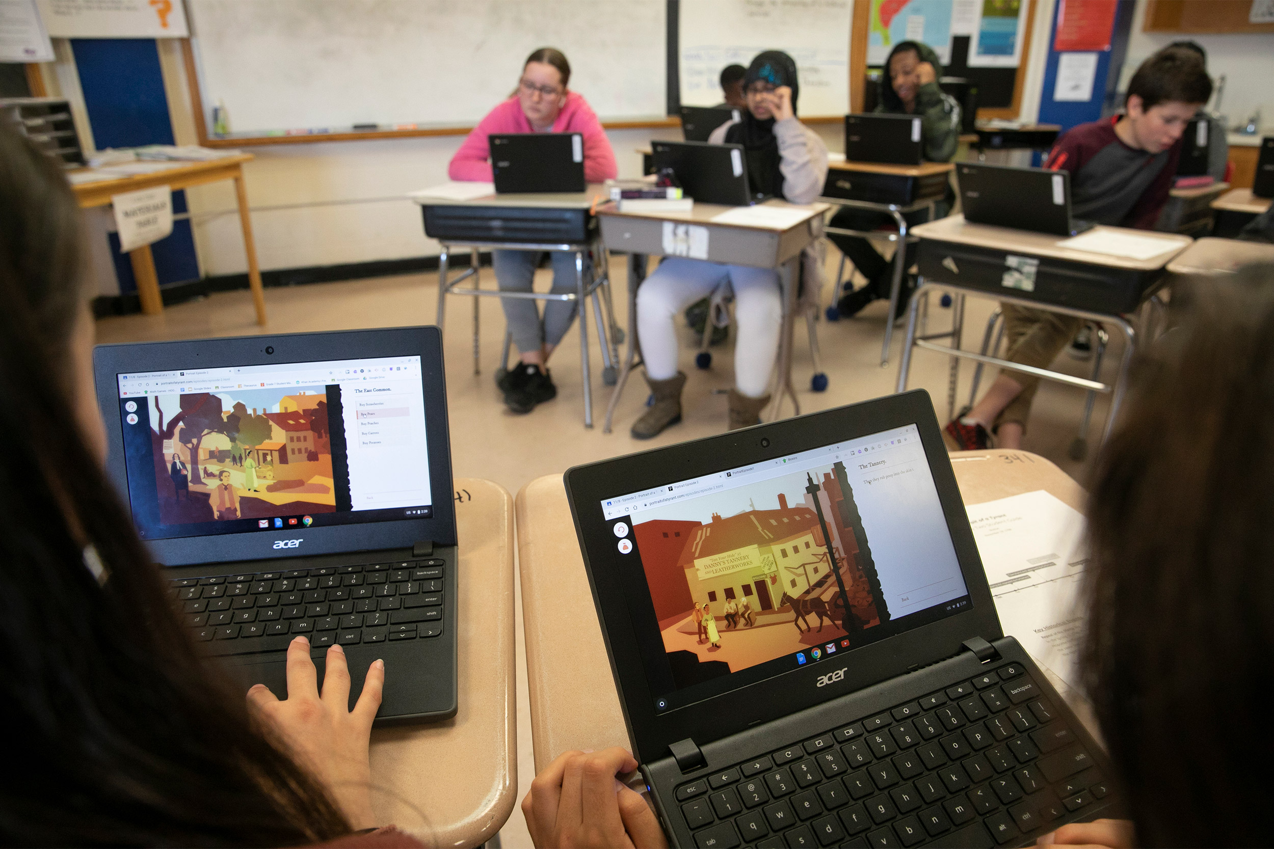 Students in classroom with computers.