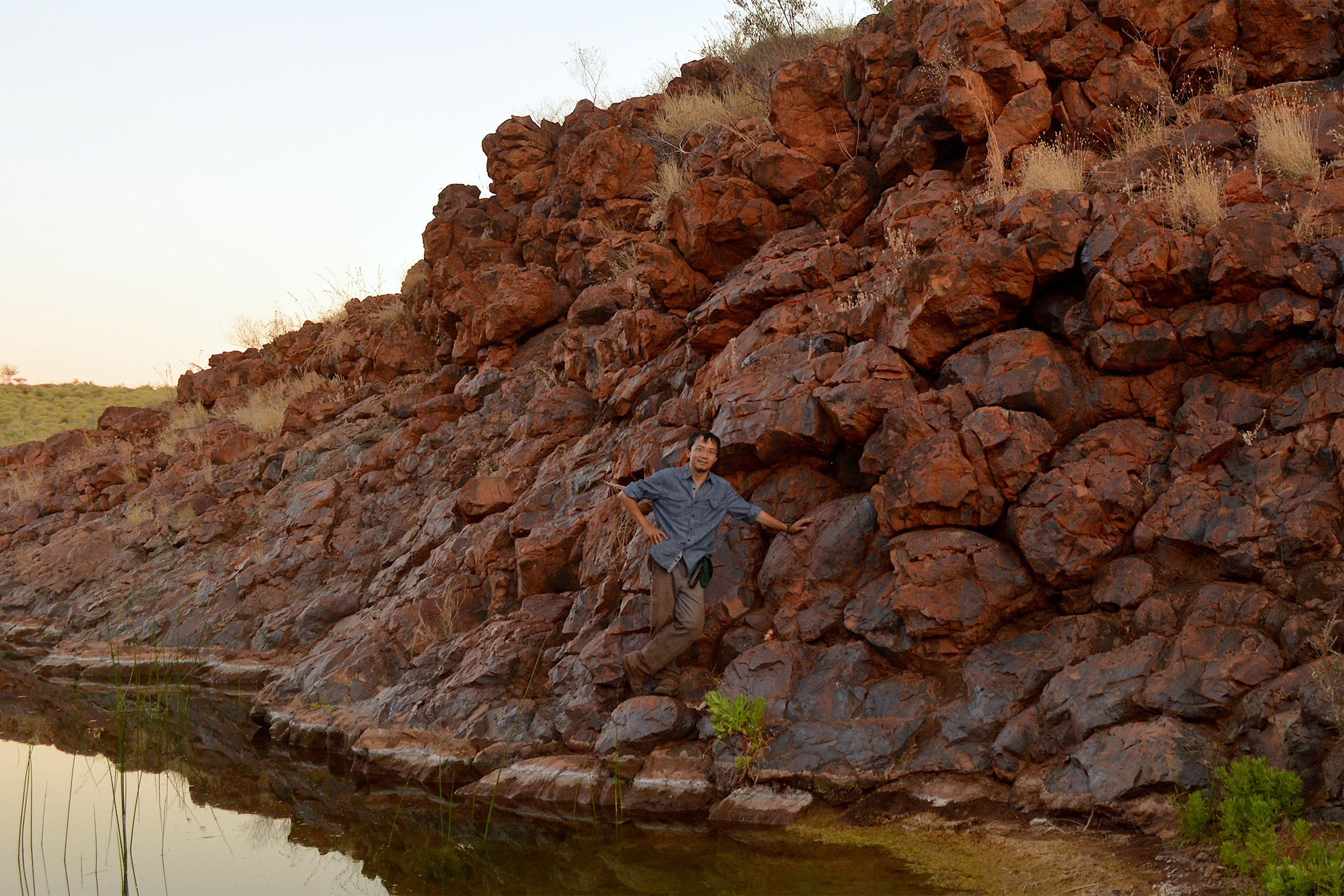 Professor Fu with rock formation.