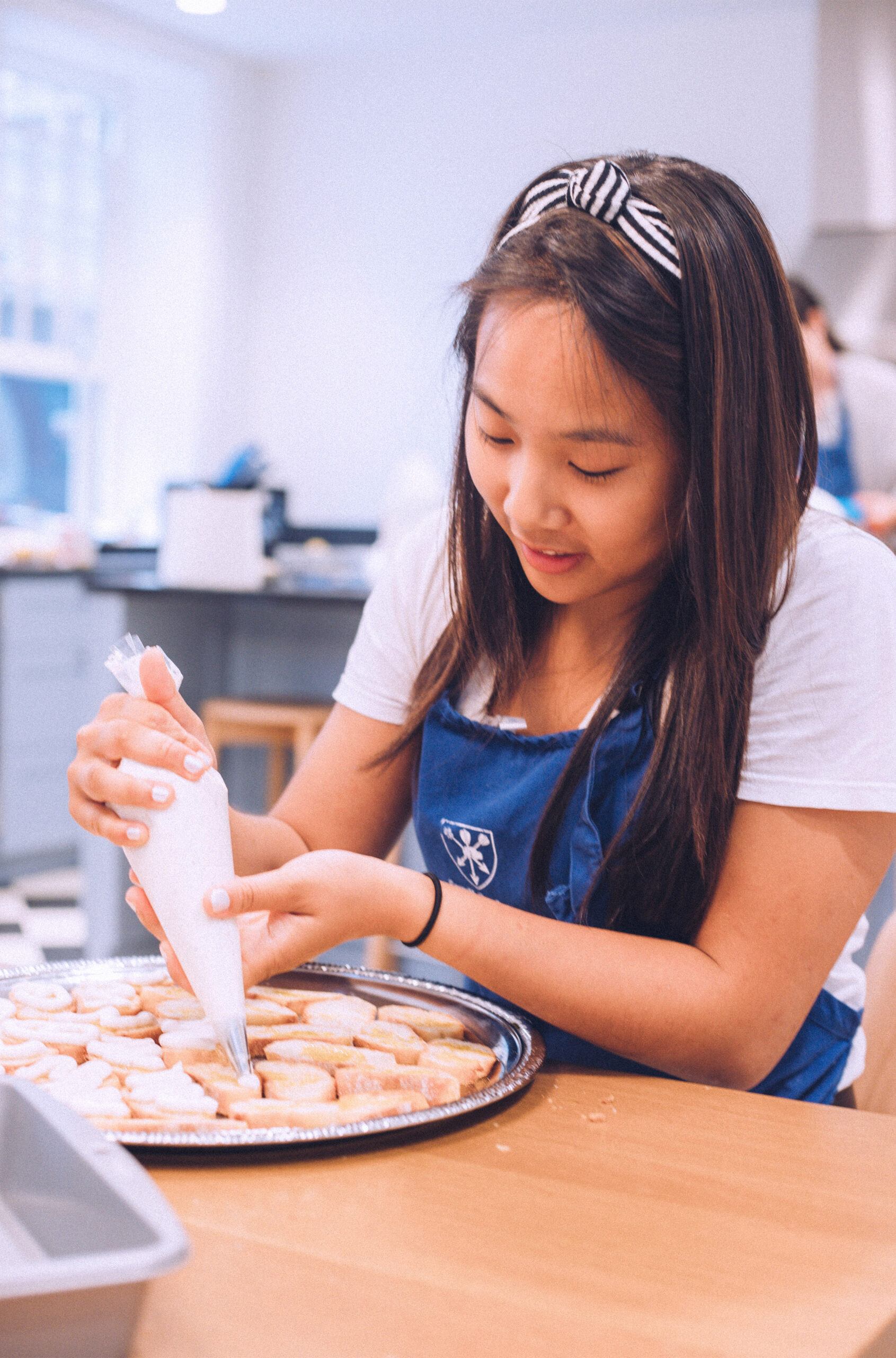 Meredith Pong cooking.