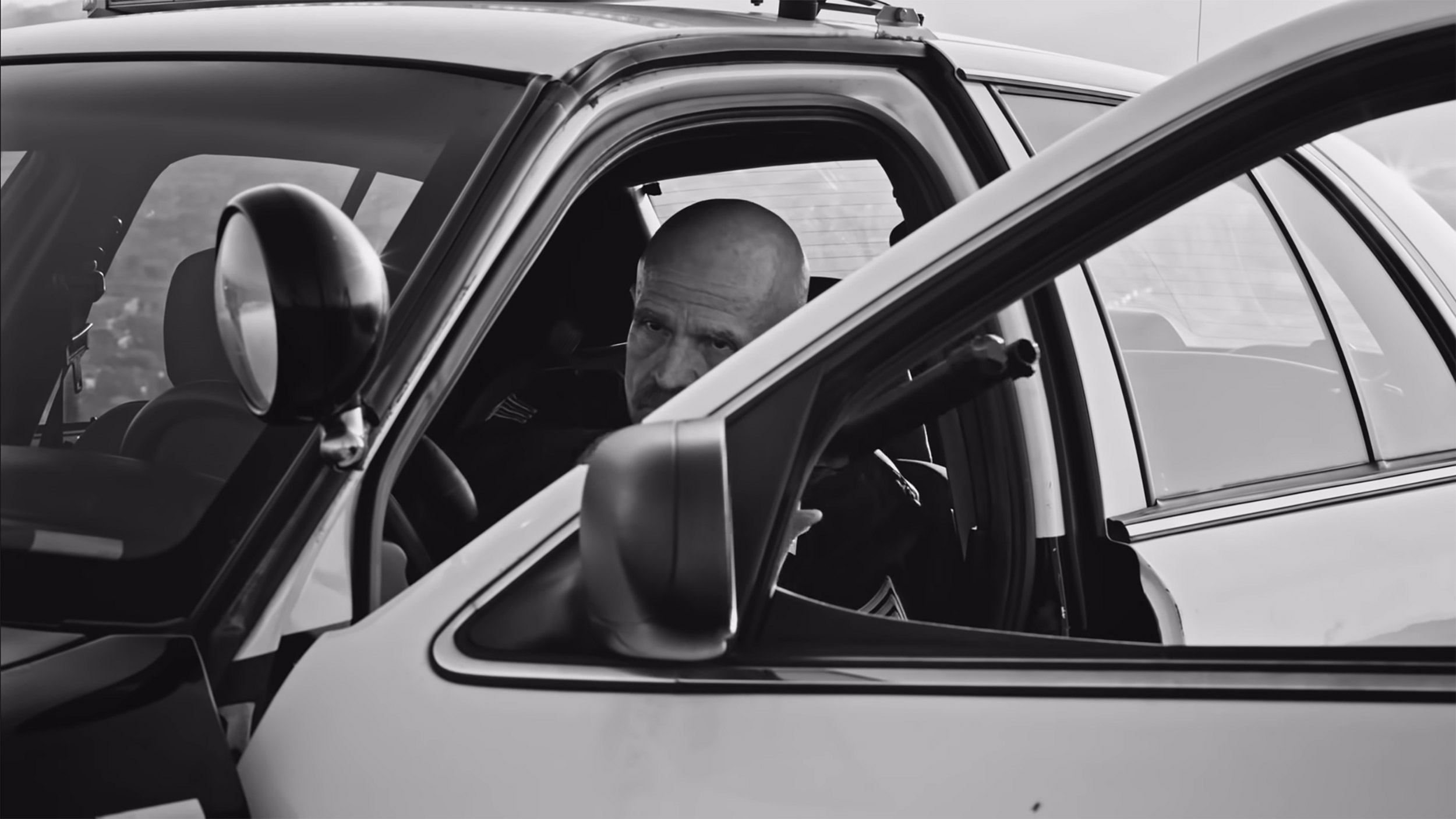 Closeup of police officer who shoots down Kendrick Lamar in "Alright" video.