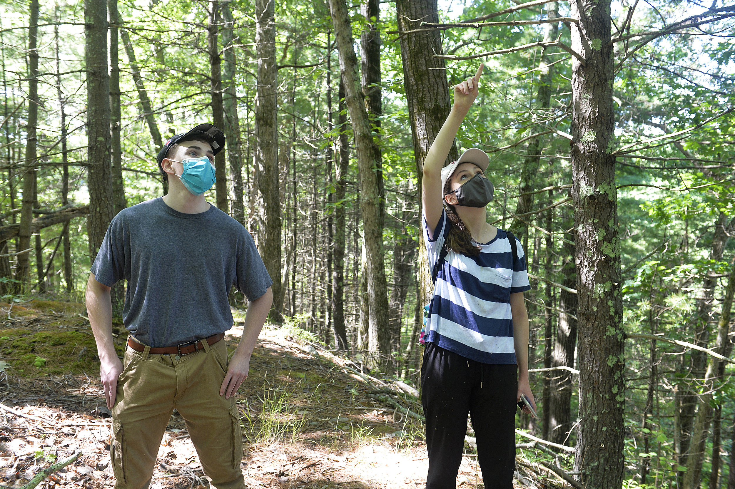 Kate Guerin with her brother in the woods.