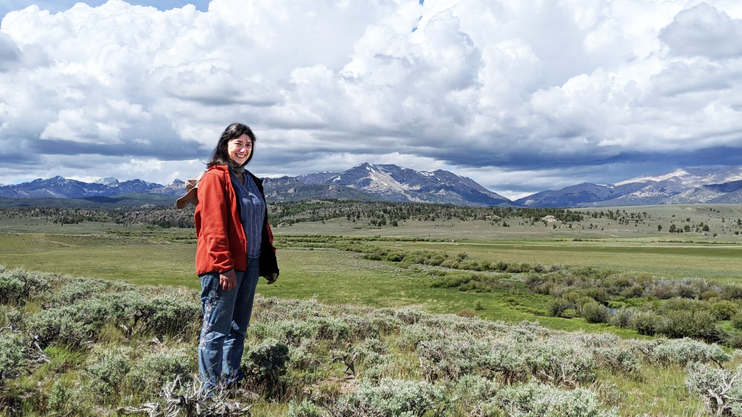 Monica Bertagnolli standing in a mountain