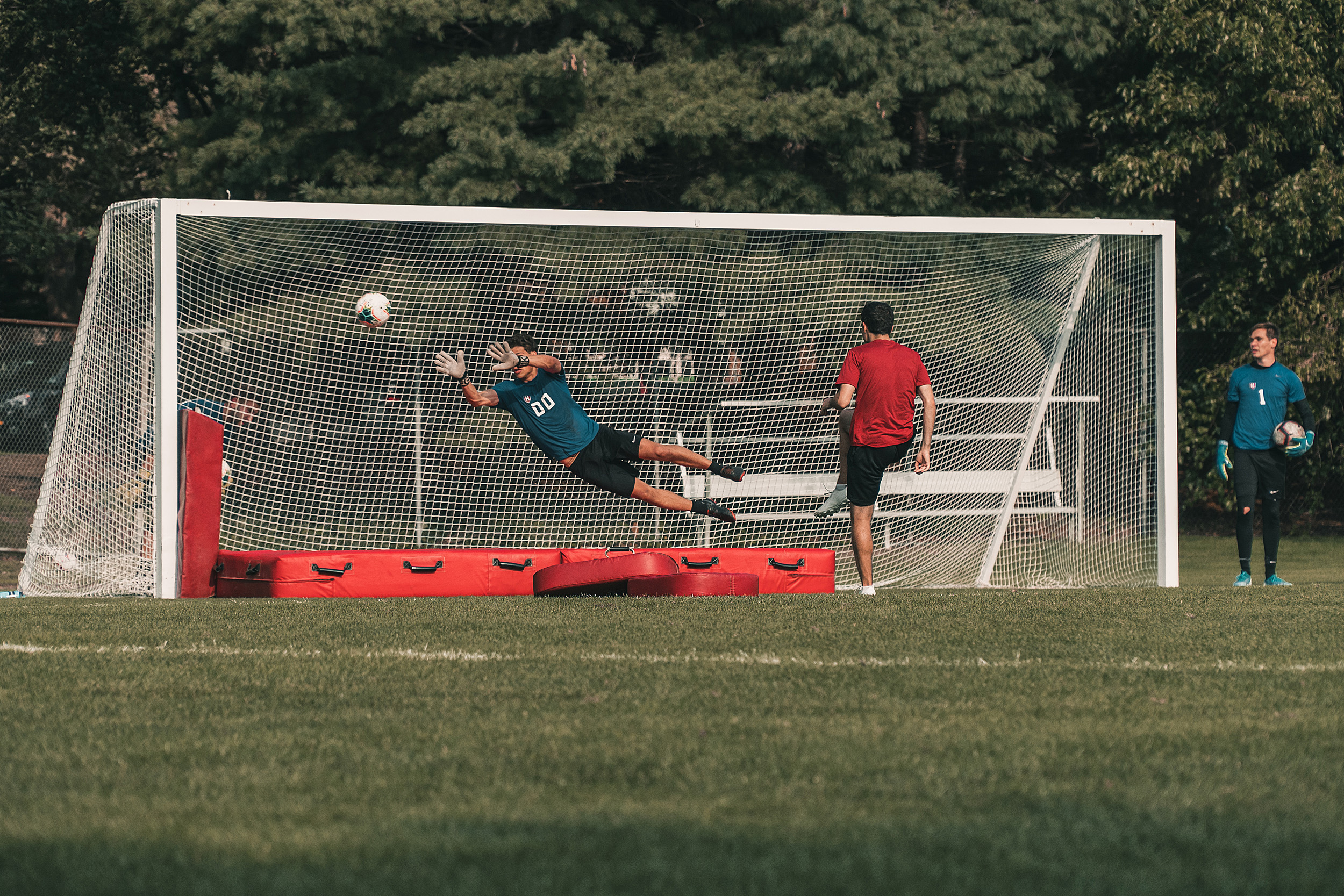 Philip Geanakoplos playing soccer.