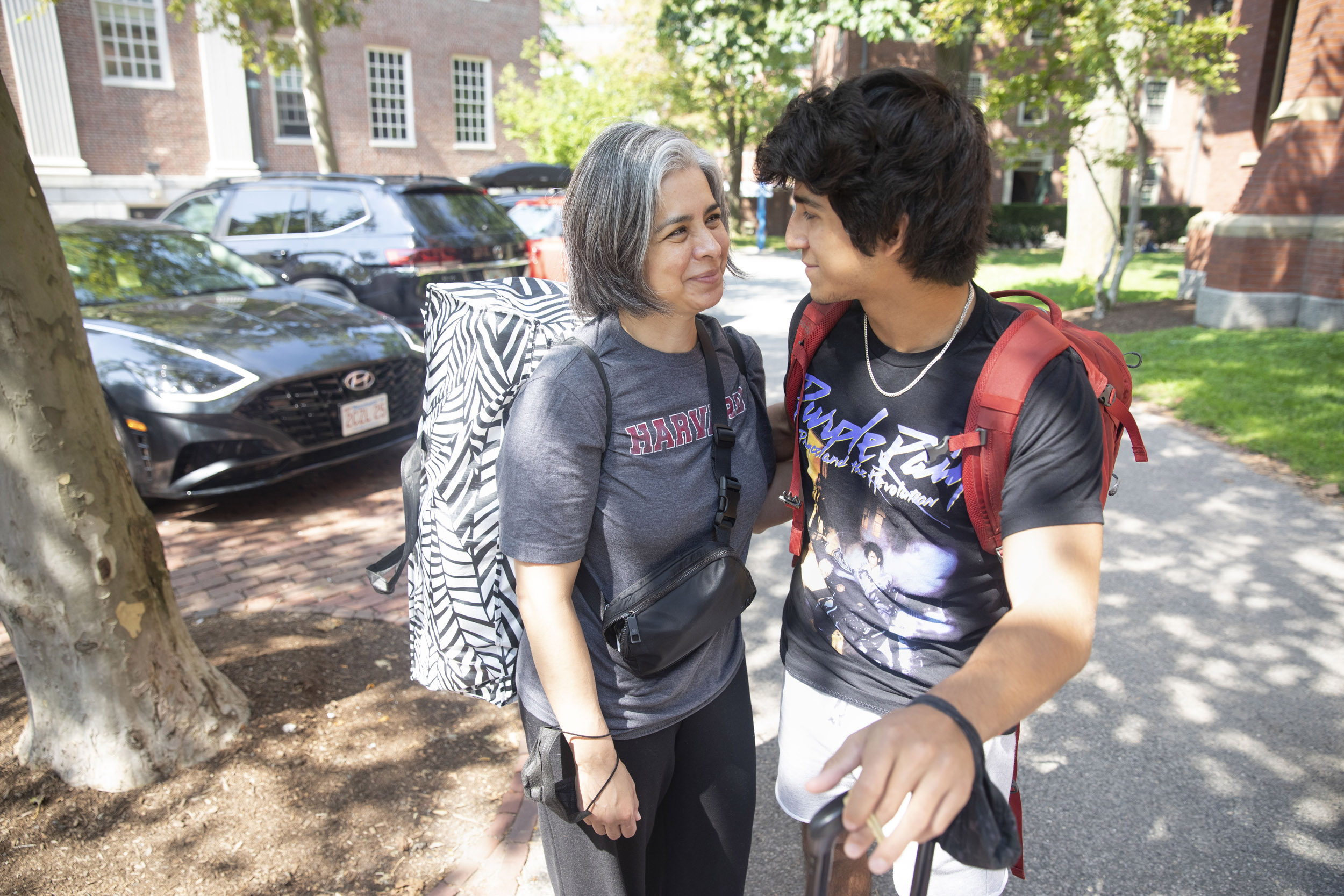 Diego Sotelo ’25 is embraced by his mother, Monica.