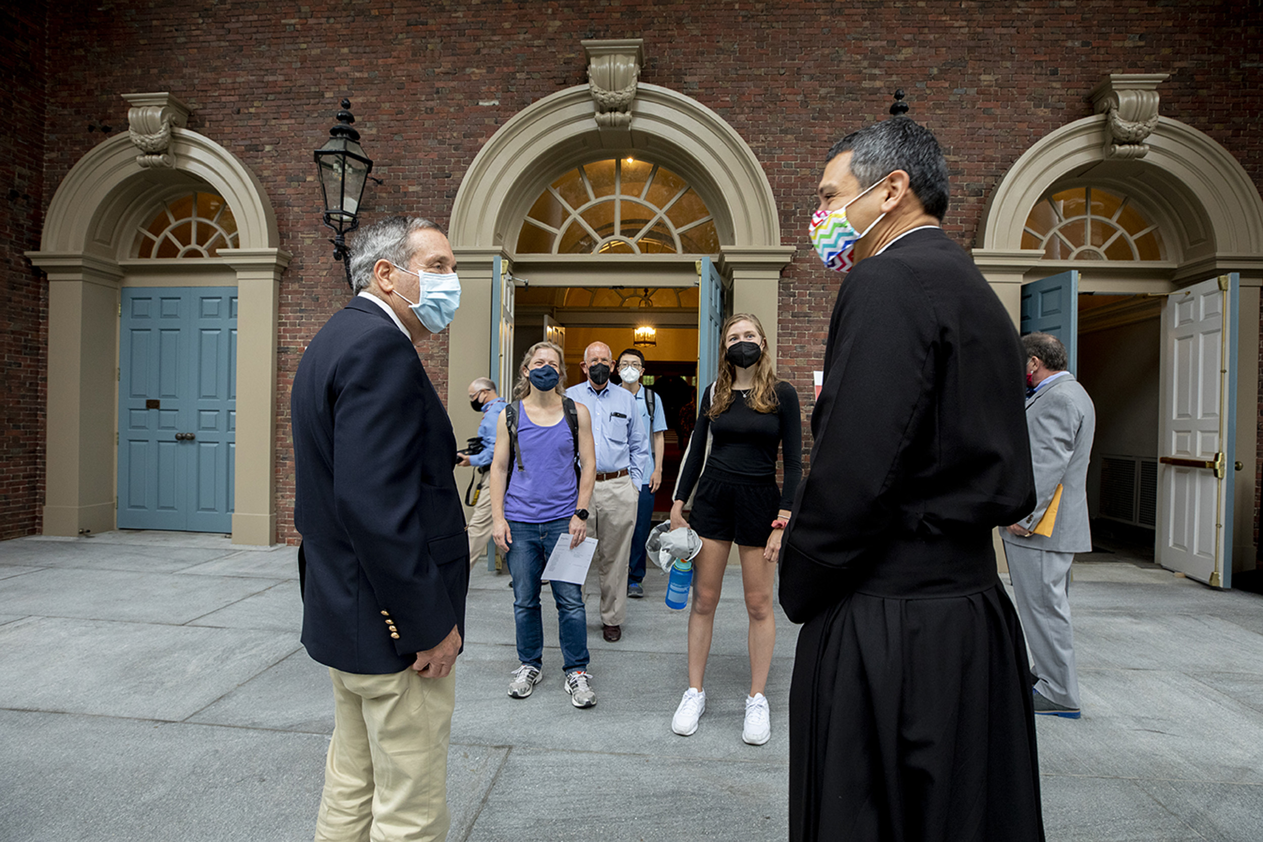 Larry Bacow and the Reverend Matthew Potts,