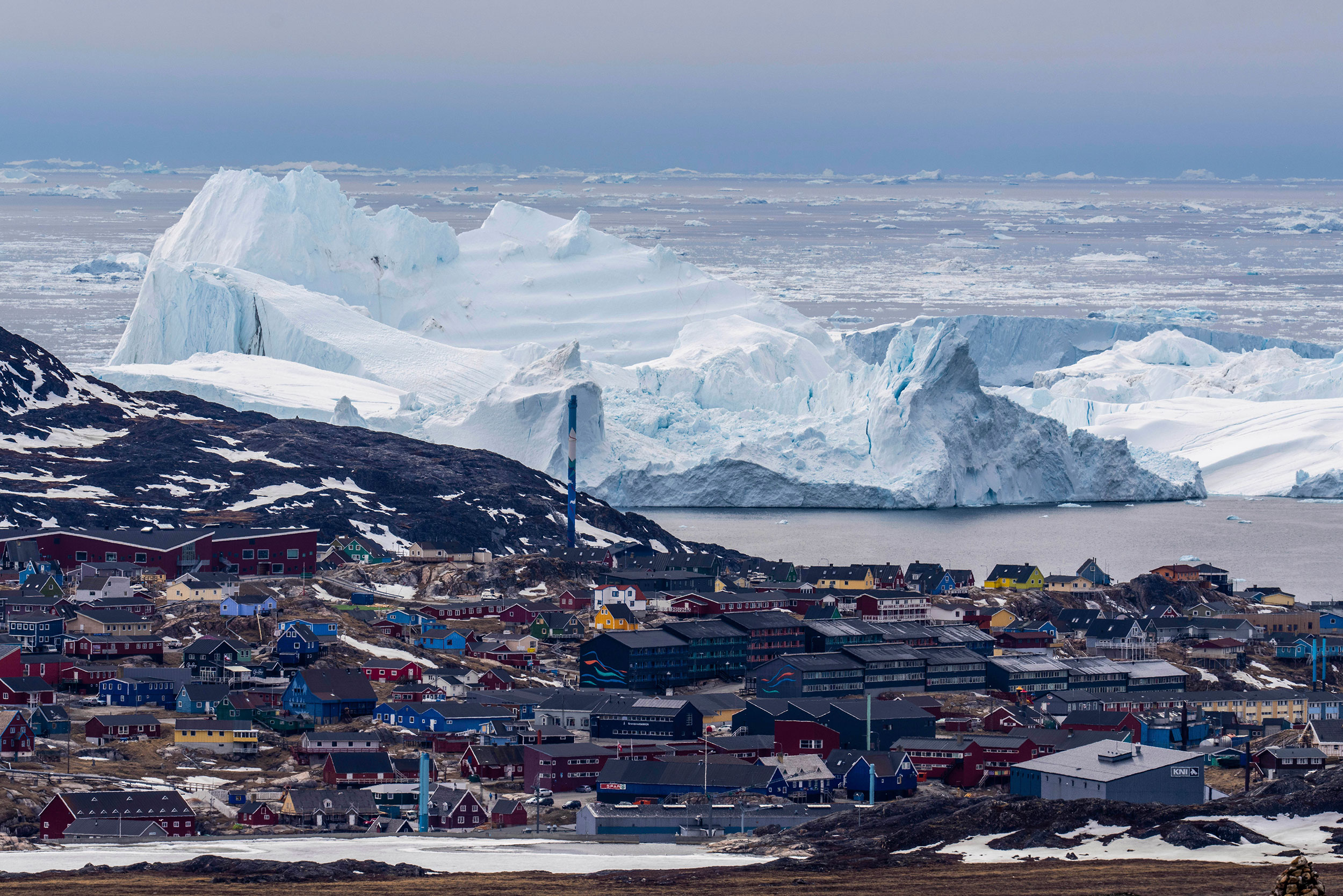 Greenland retreating icebergs.