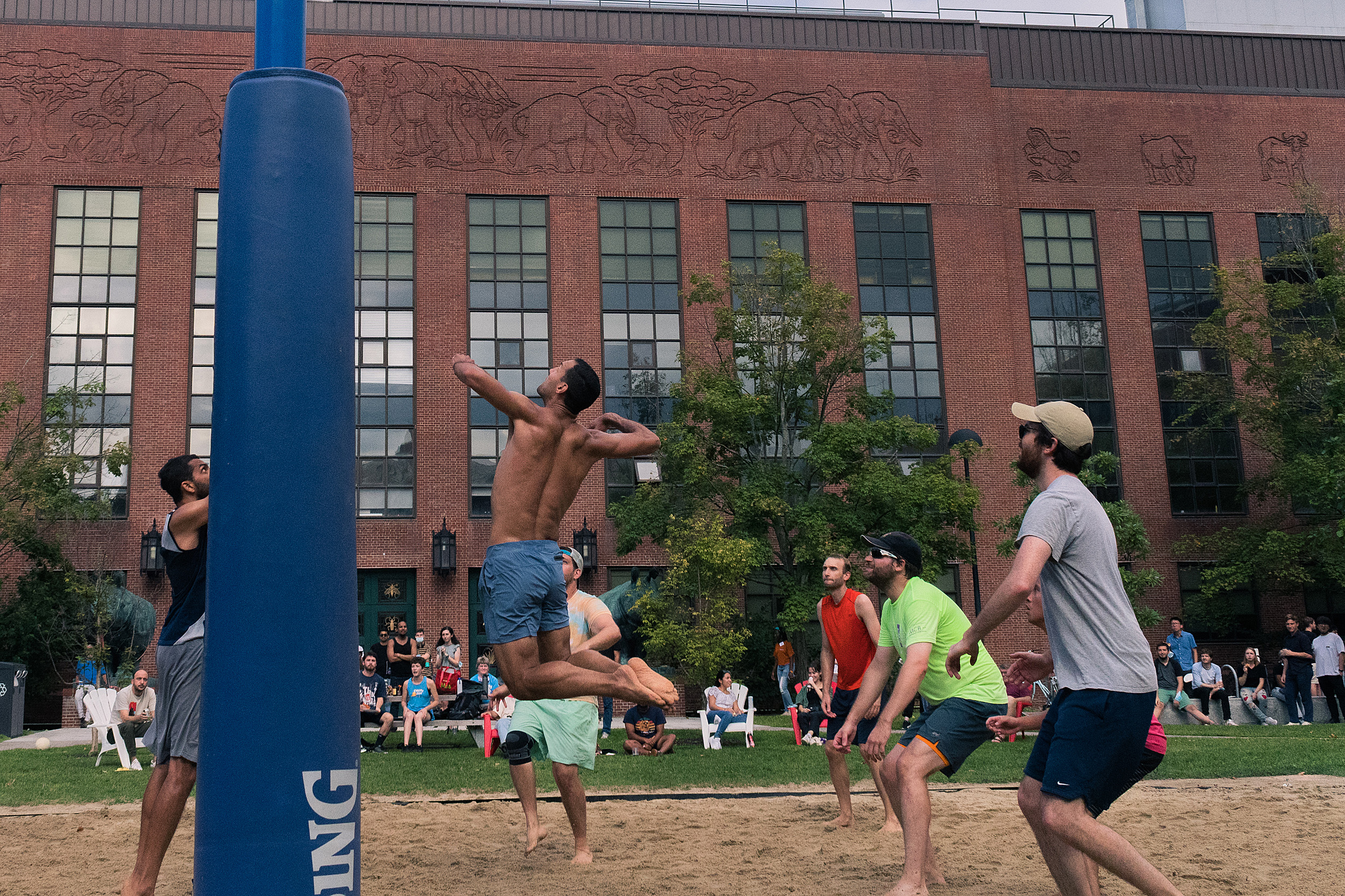 People playing volleyball.