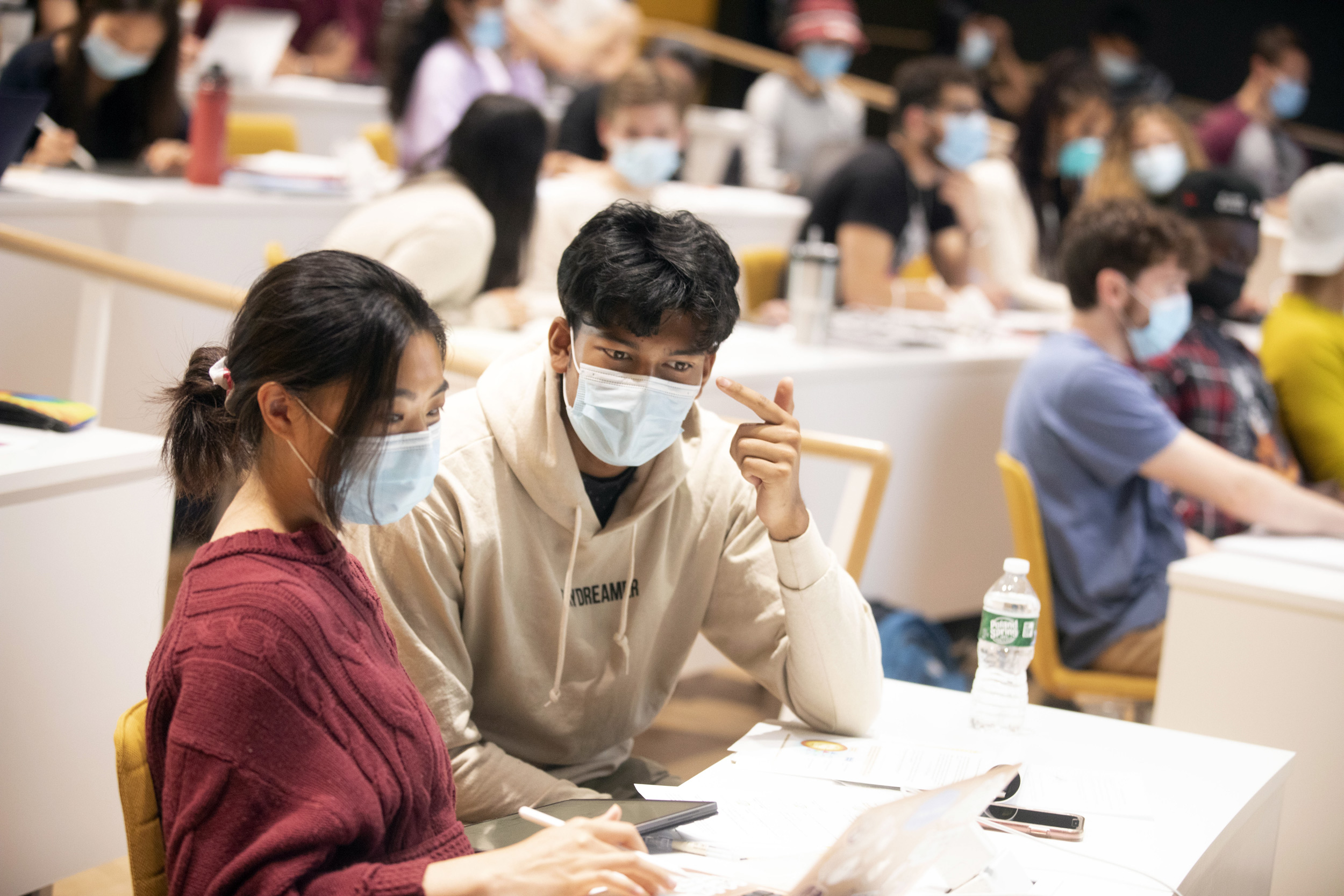 Chelsea Xia ’24 (left) and Abdul Repon ’24 study inside The Science and Engineering Complex.