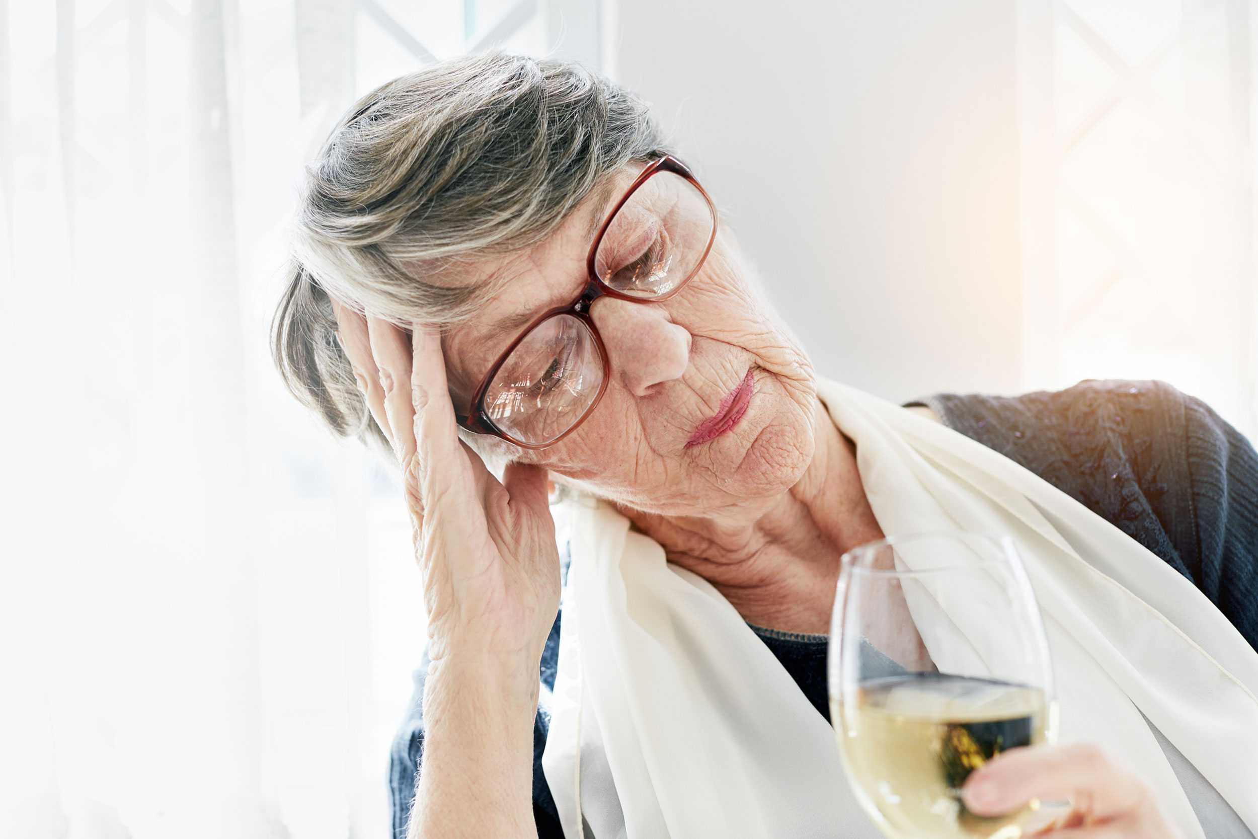 Woman drinking.