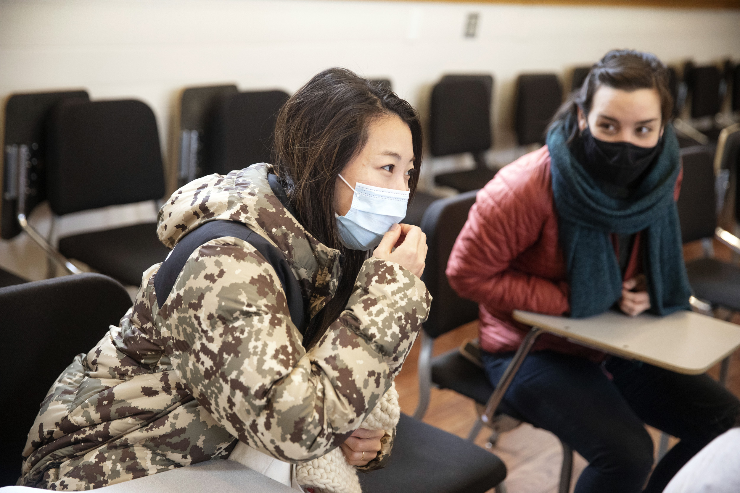 Chiaki Yoshida (left), who is auditing the course, and Stephanie Hollenberg listens to the discussion.