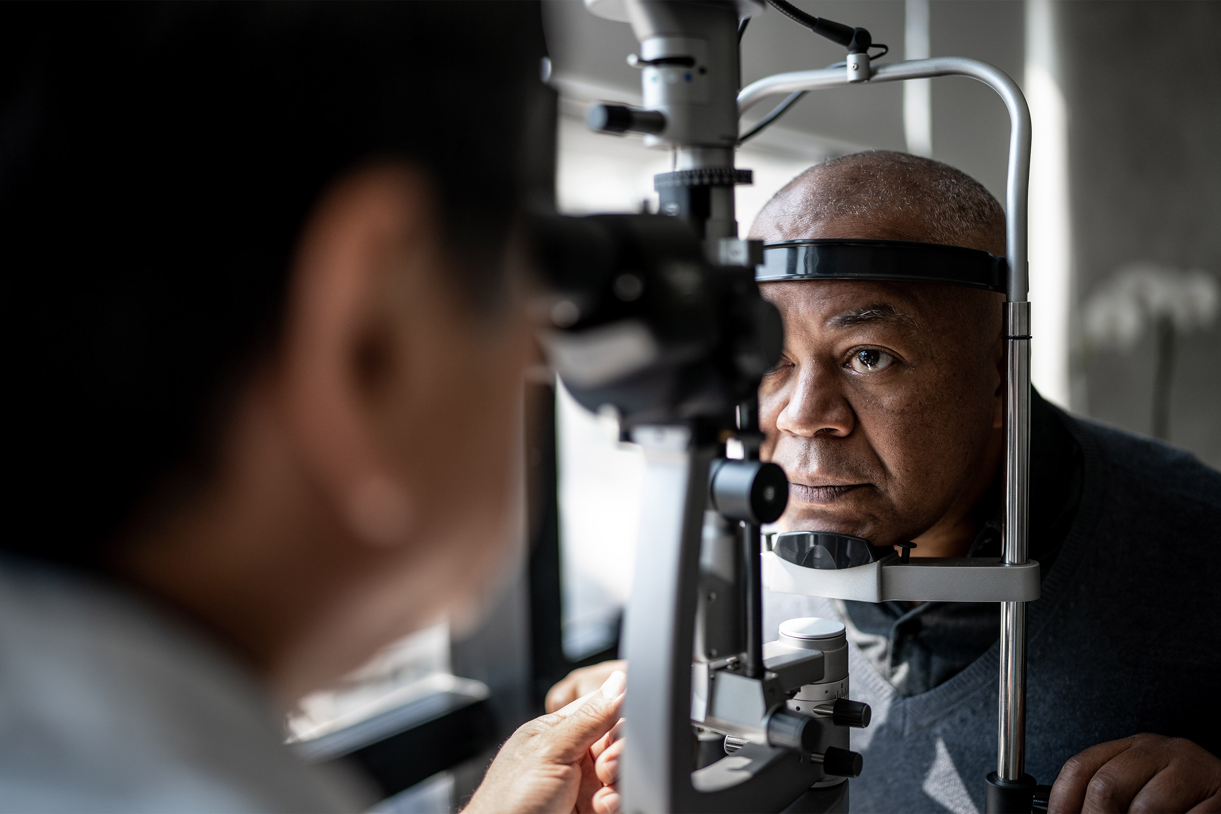 Man having eyes checked.