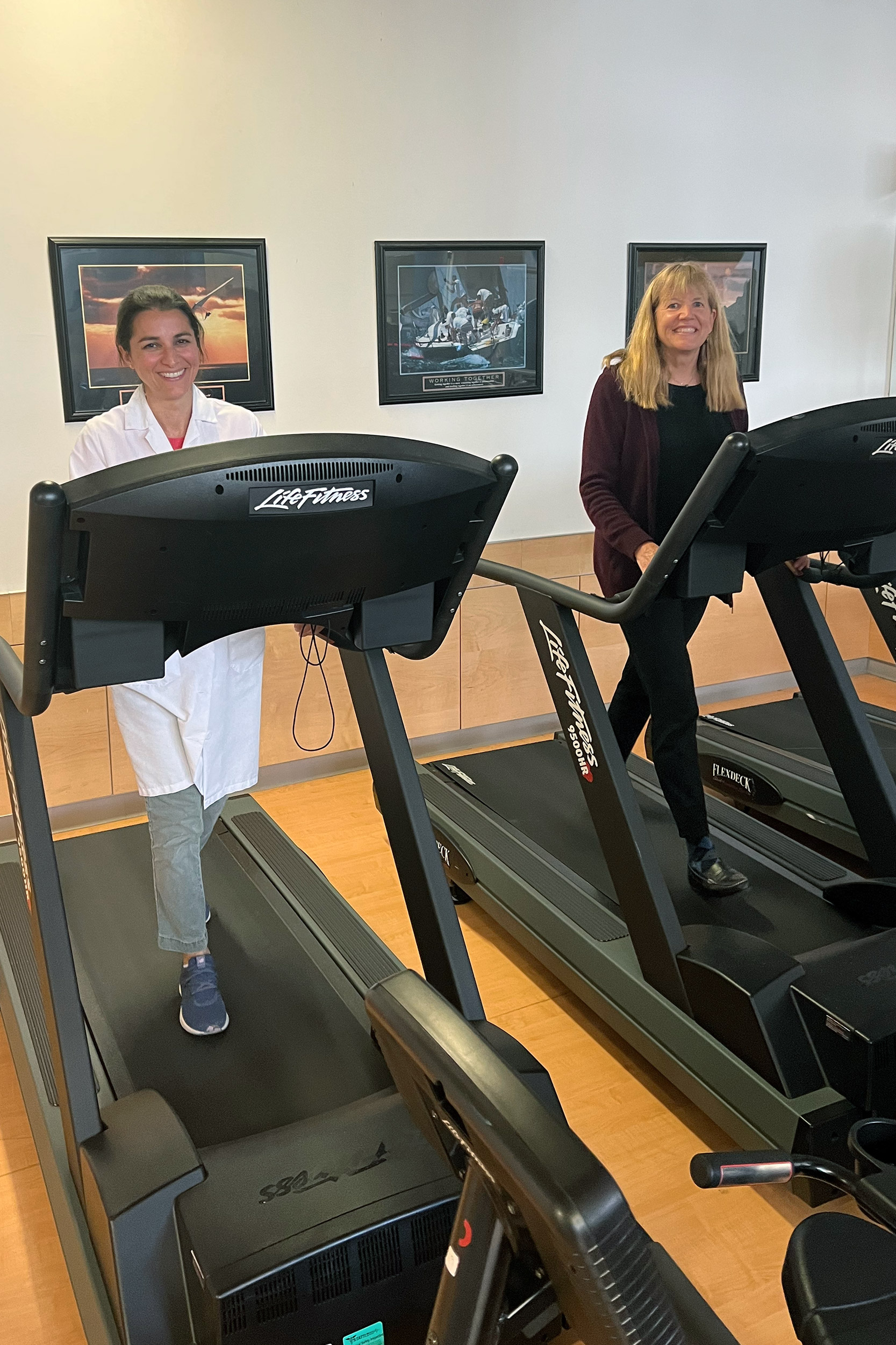 Researchers on treadmills.