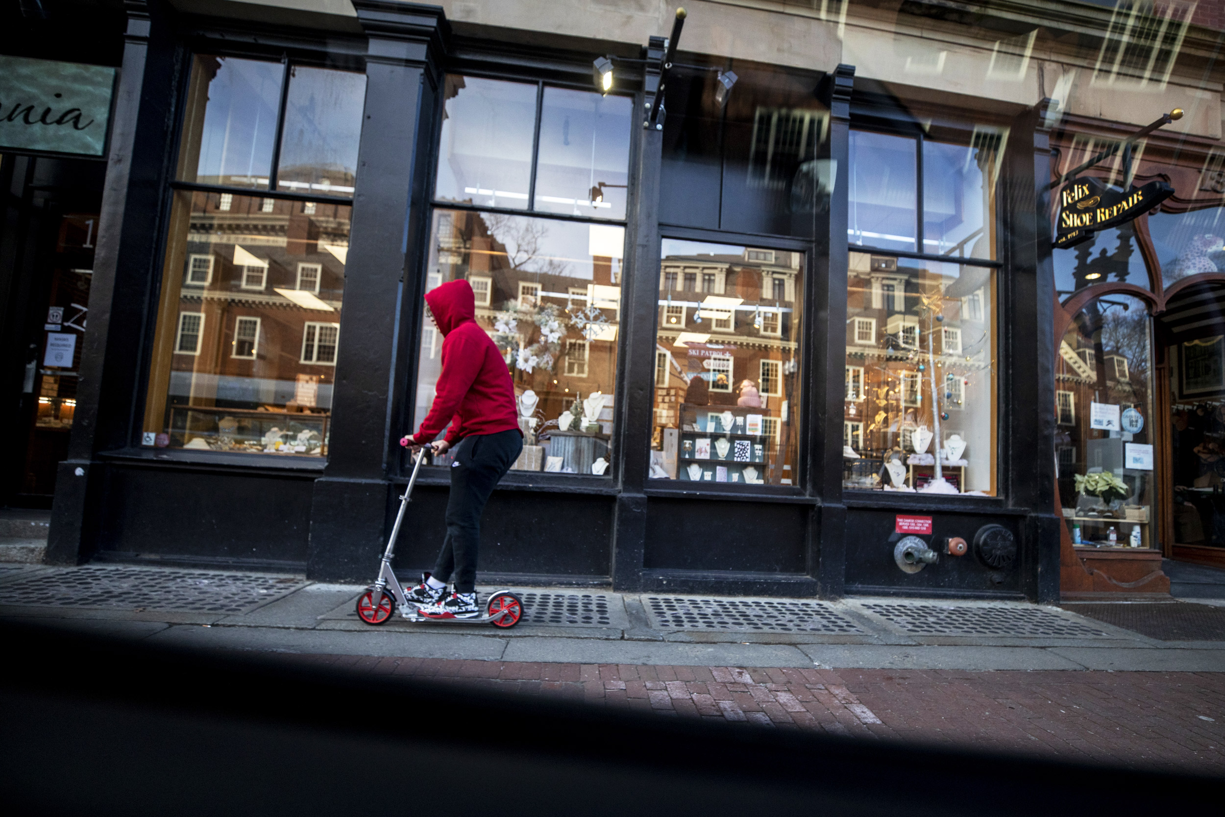 A person on a scooter.