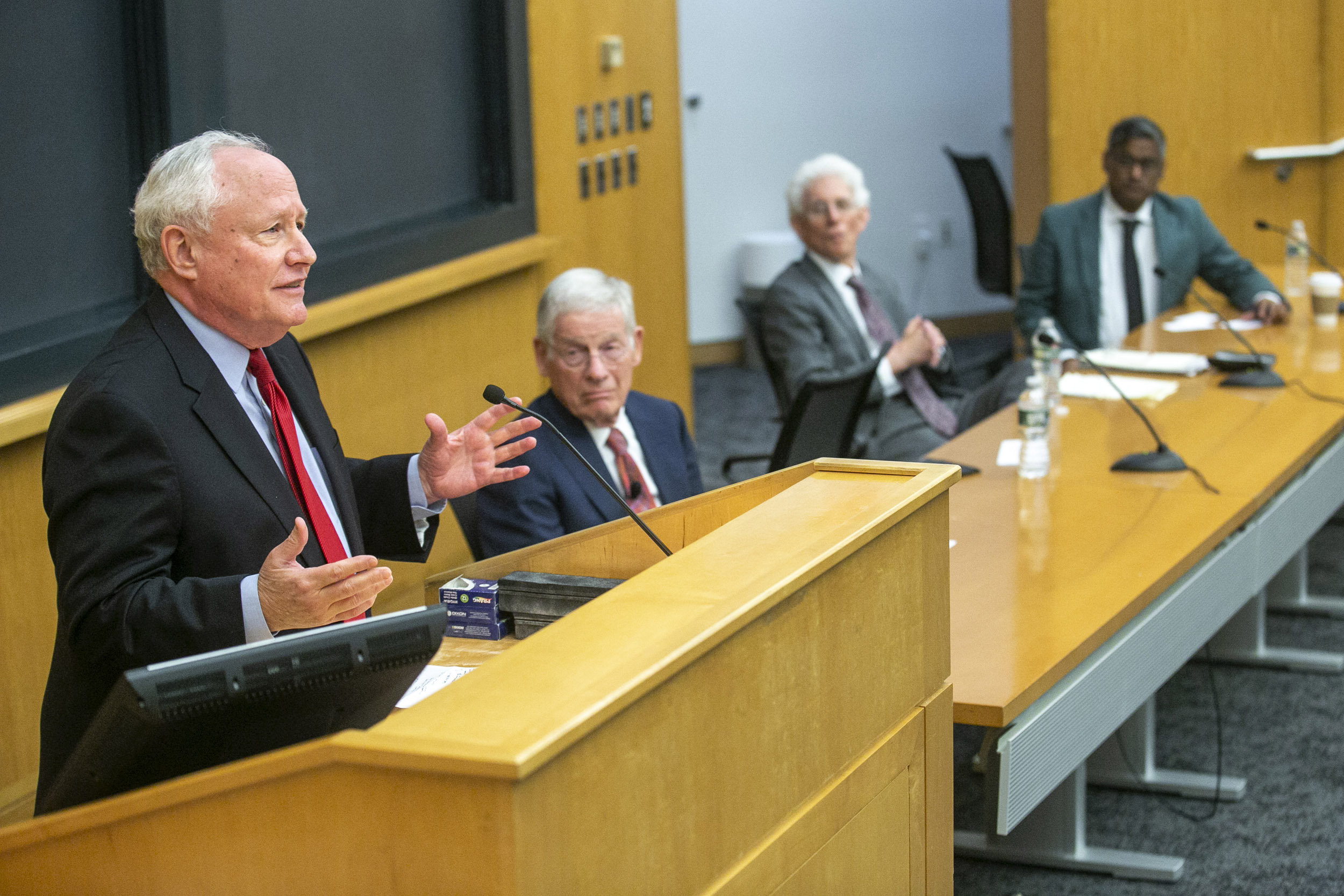 Panelist William Kristol, speaks, as Harvey Mansfield, William Galston, and Ramesh Ponnuru listen.