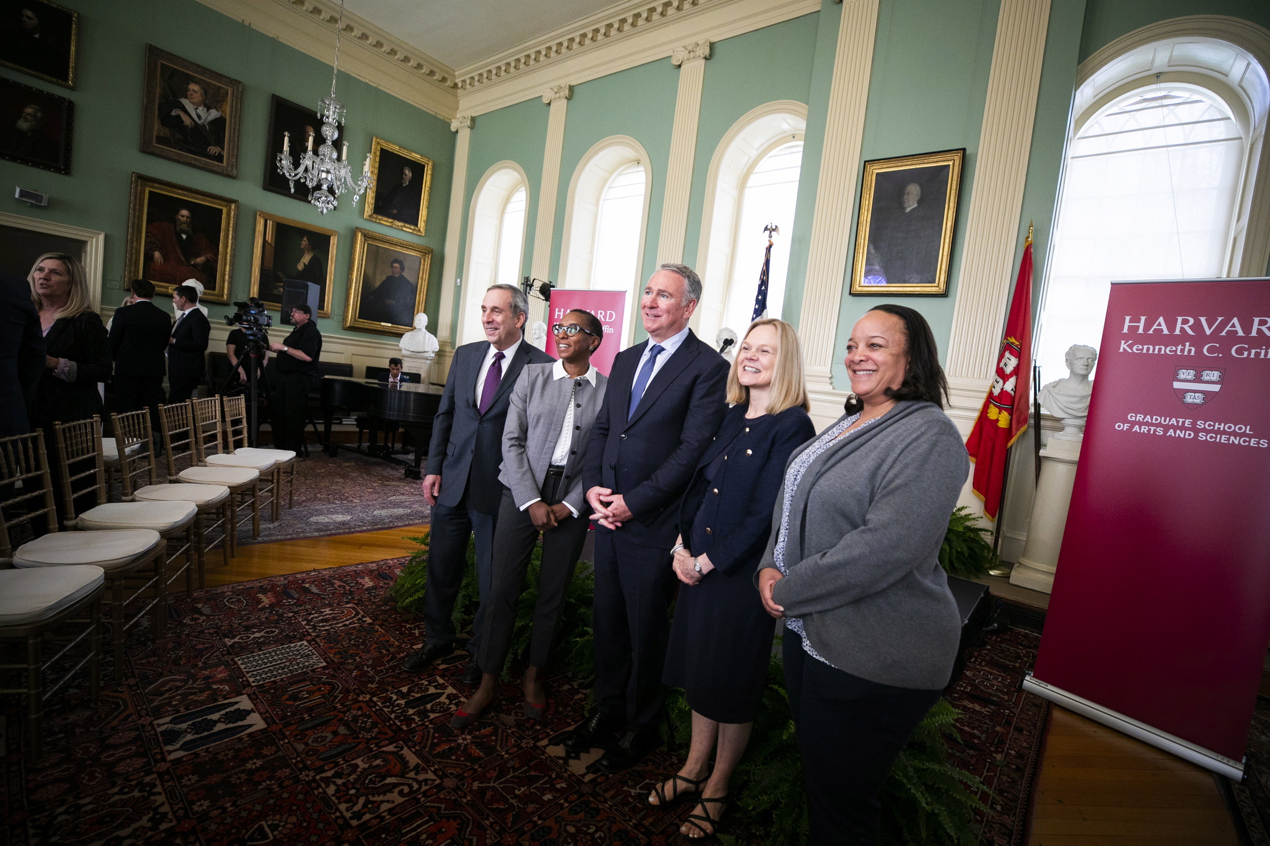 Larry Bacow, Claudine Gay, Kenneth Griffin, Emma Dench, and Bridget Long in University Hall.