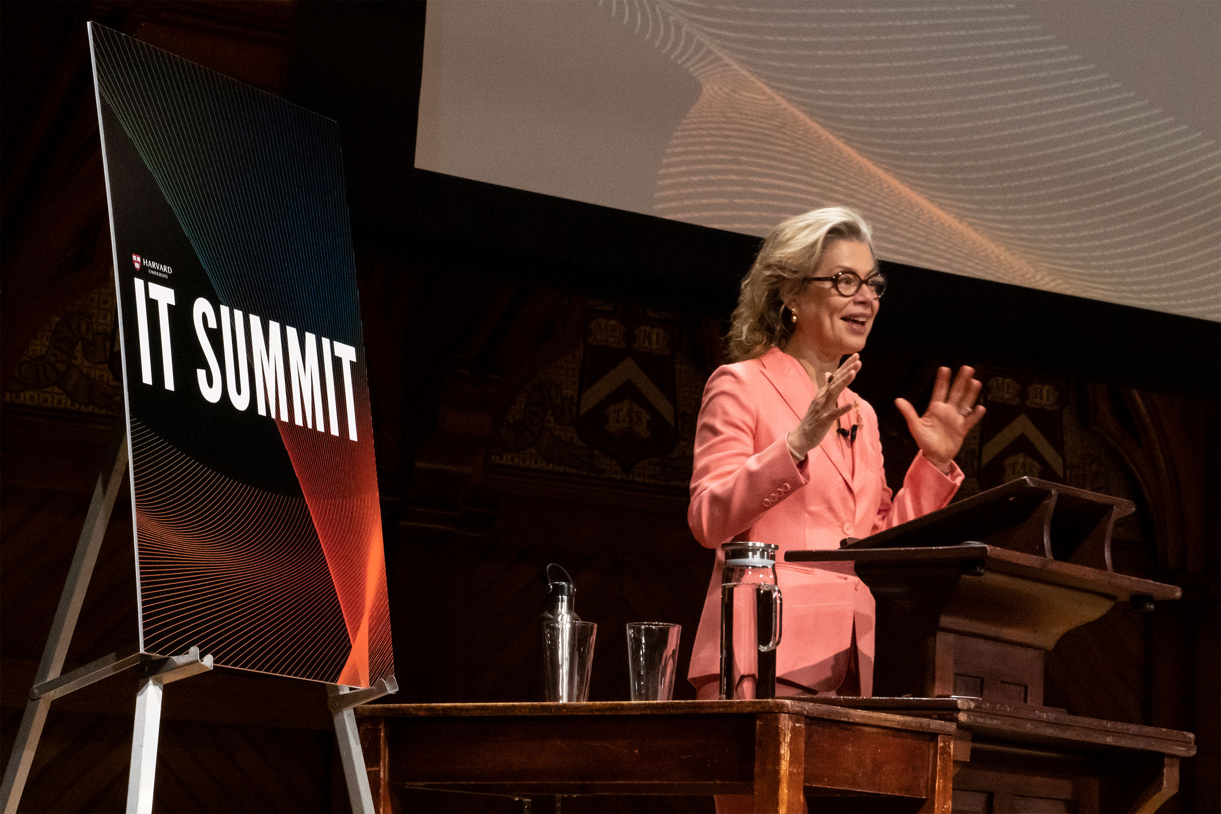 Woman speaking at podium 