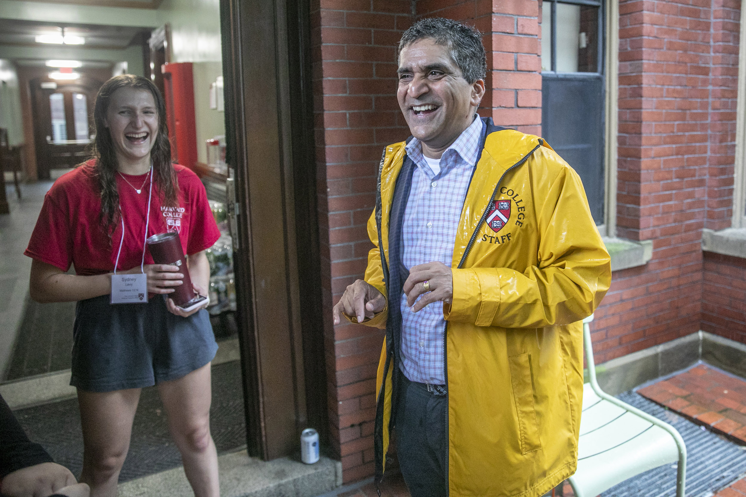 Dean Rakesh Khurana enjoys a laugh with Sydney Levy at Matthews Hall.