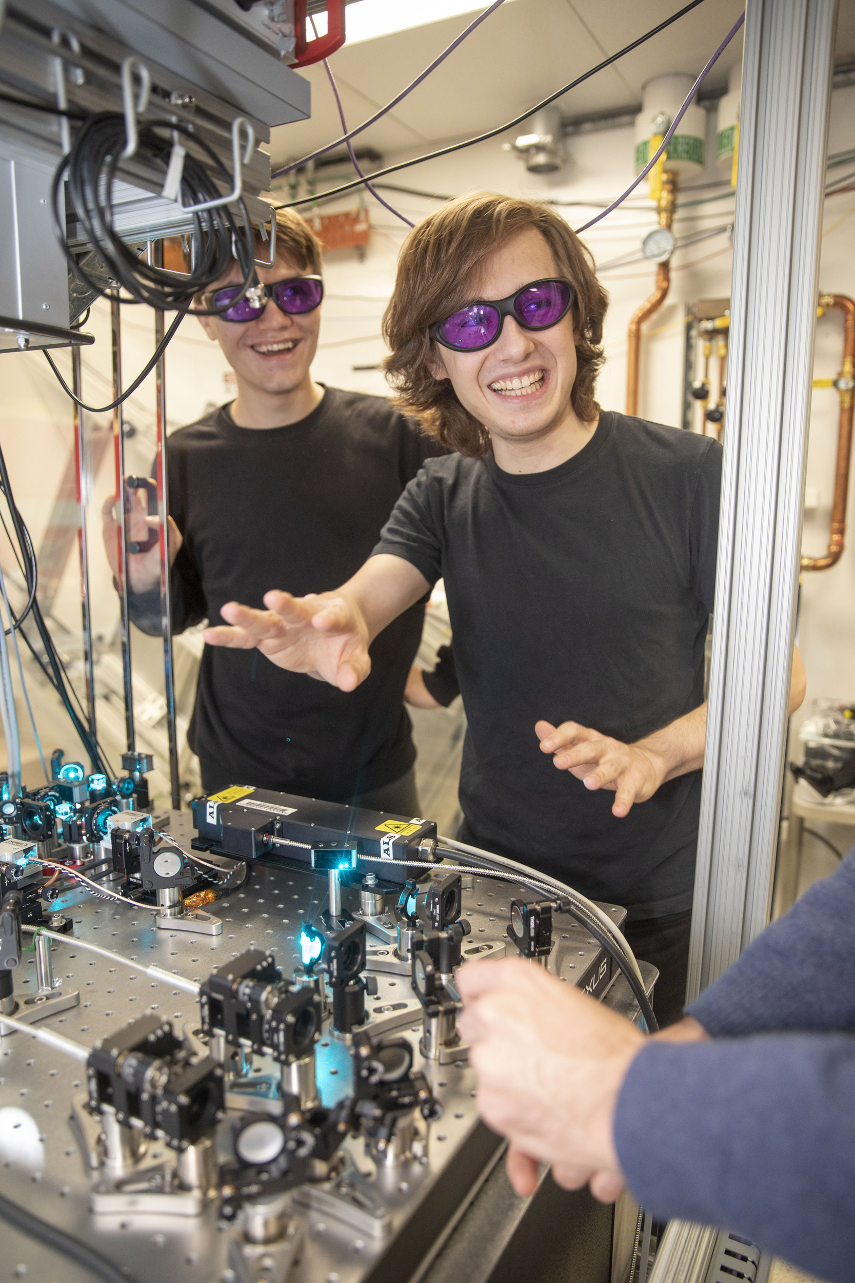 Michal Szurek and Alexander Douglas, and Ognjen Markovic “analyze images of single atoms."