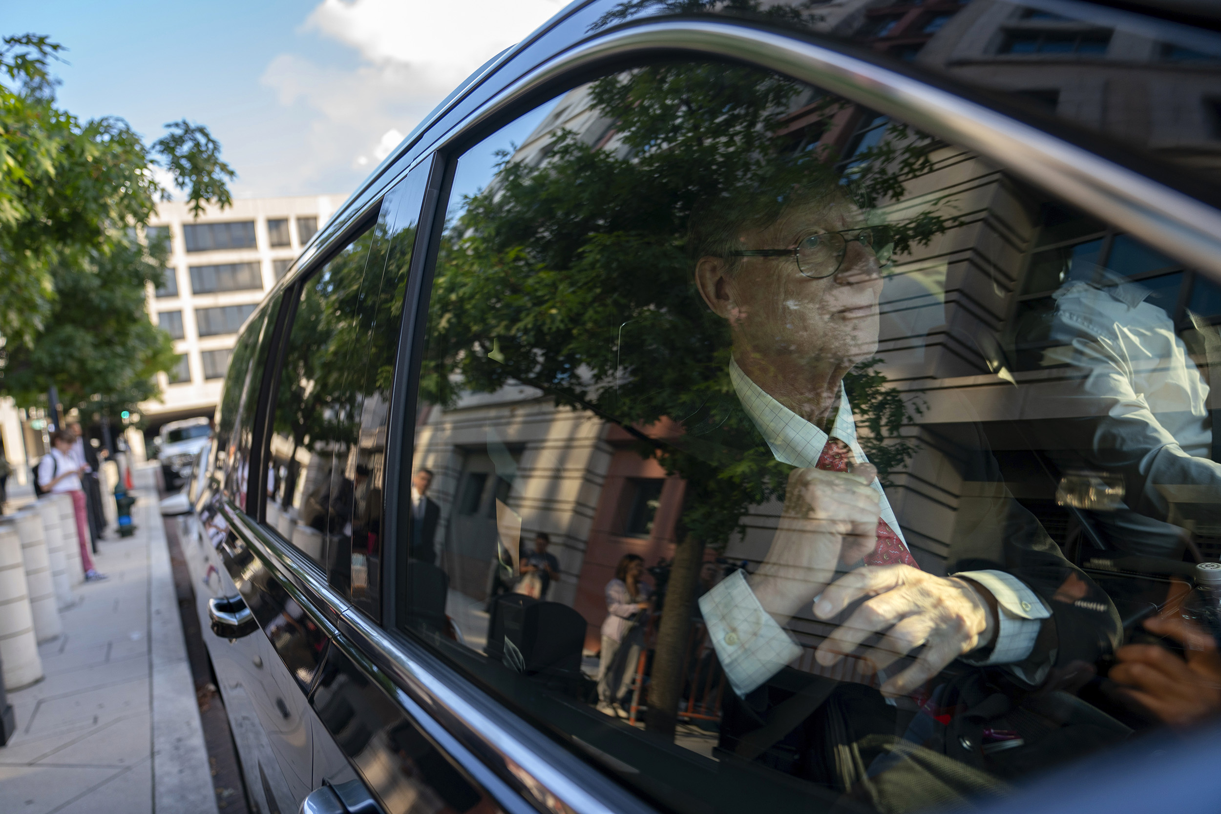 Google executive leaves court in car.