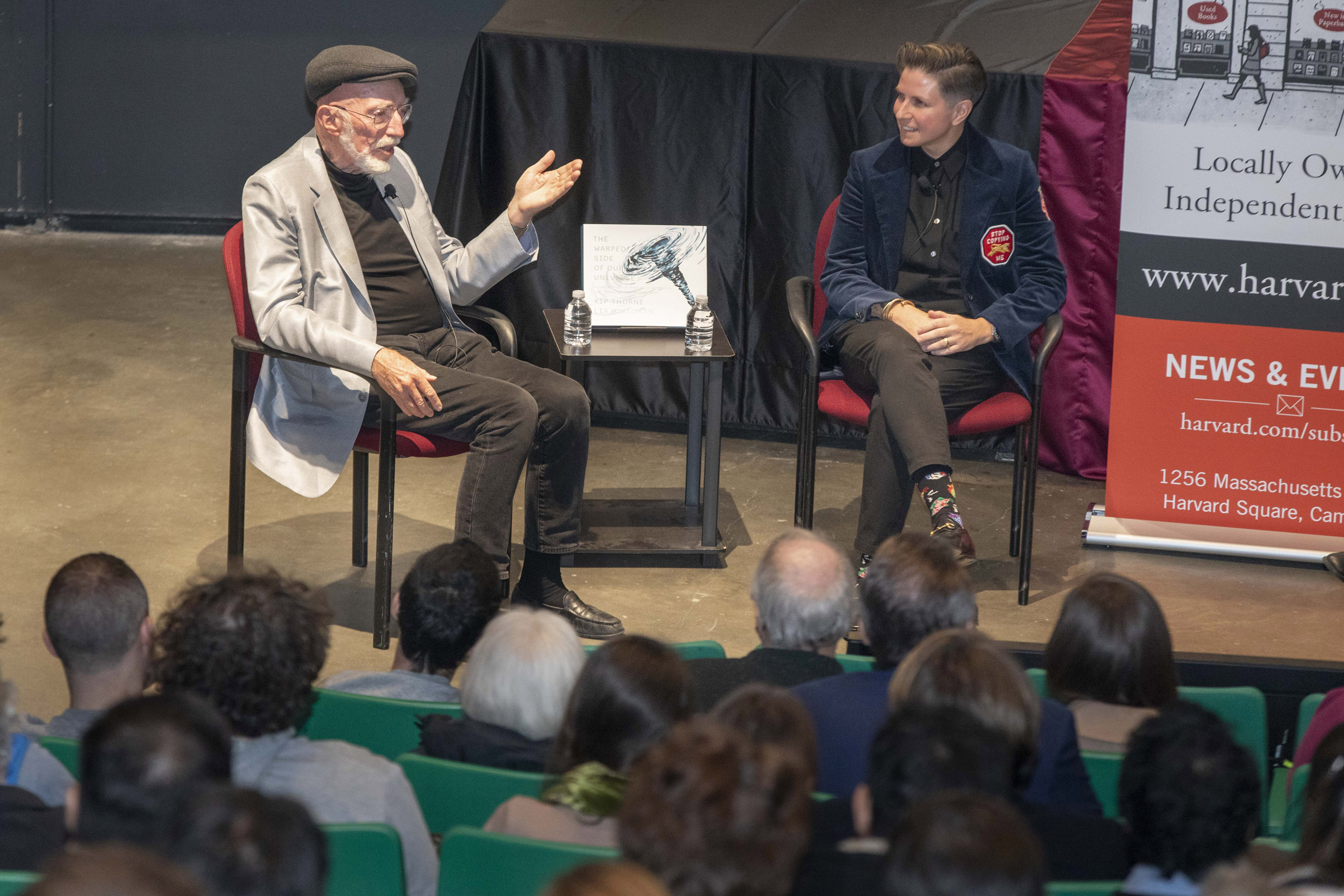 Kip Thorne and Lia Halloran seated on stage.