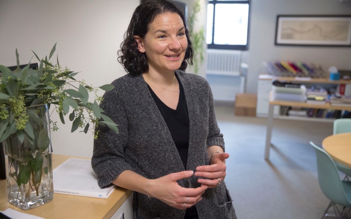 Emily Balskus standing in her office