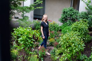 Tia Akins in the rain garden