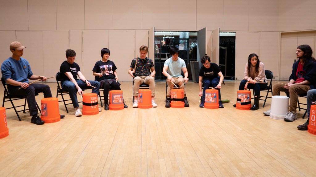 THUD members use buckets as drums.