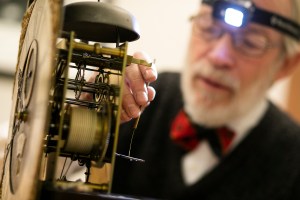 Richard Ketchen working on a clock.