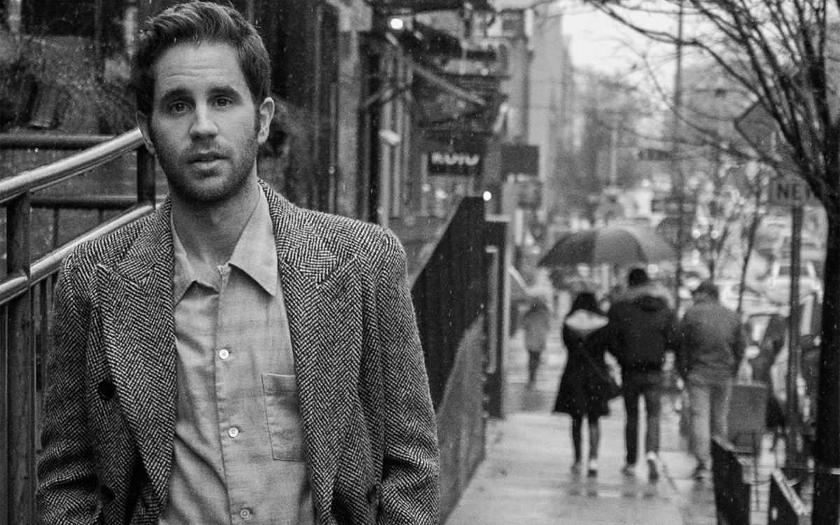 Actor Ben Platt on city street.