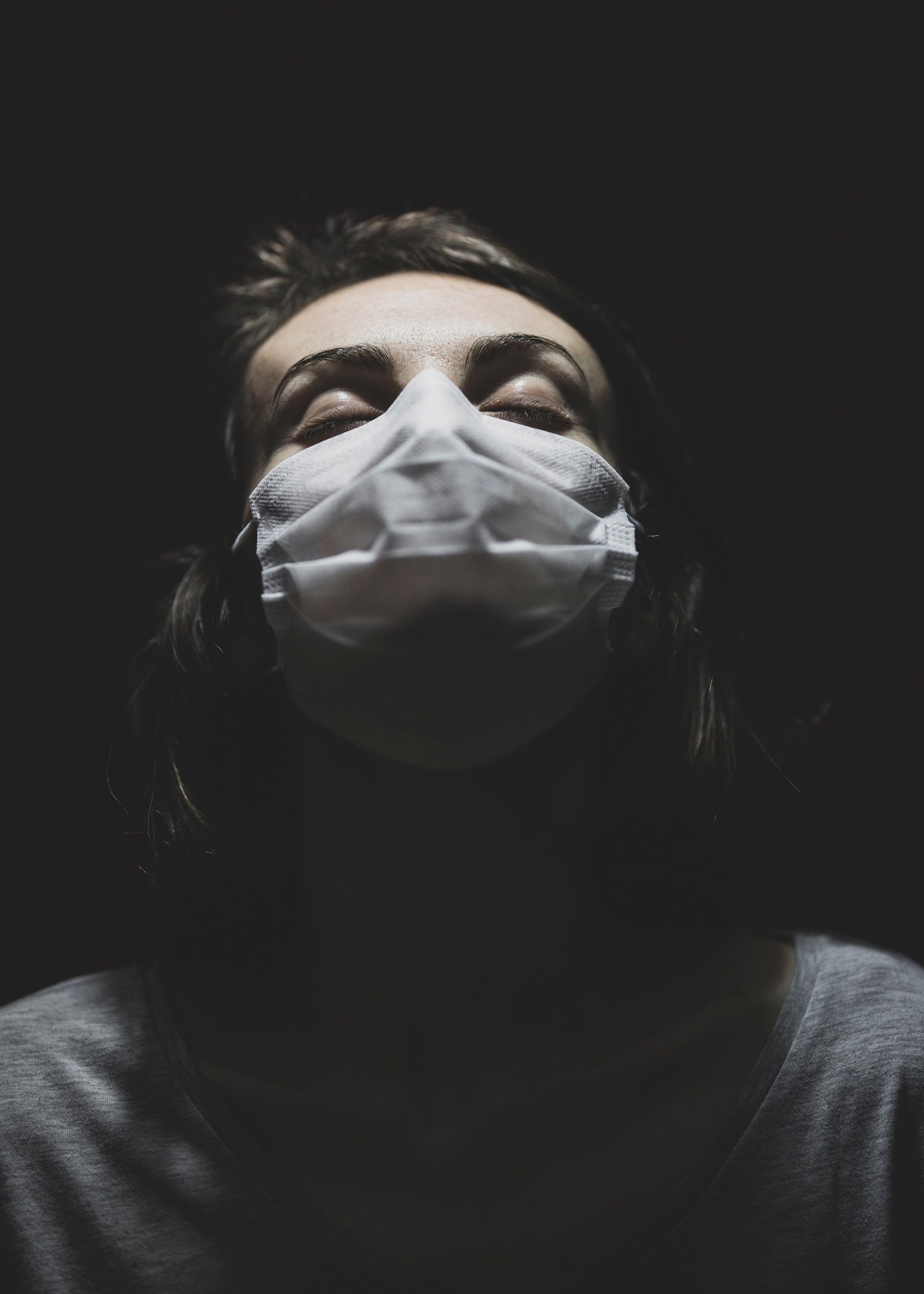 Woman in mask destressing.