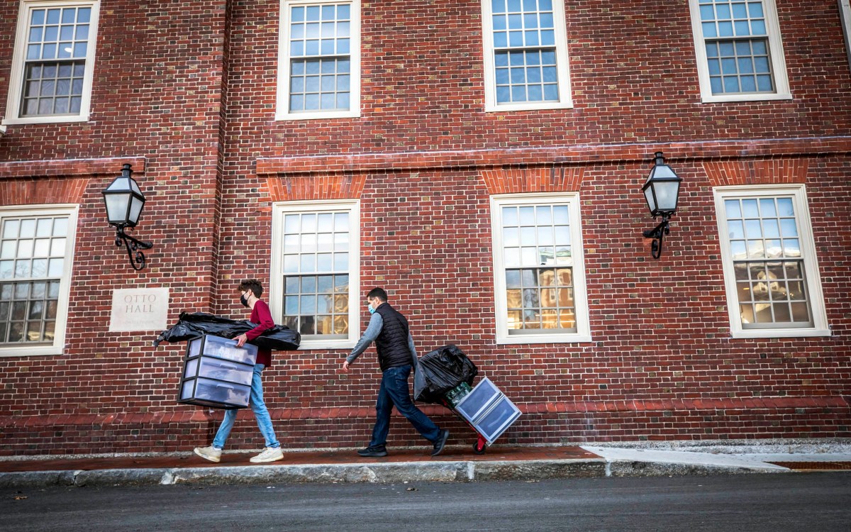 Walking with boxes.