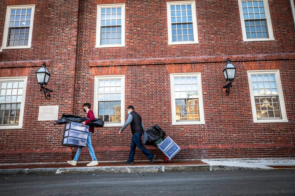 Walking with boxes.